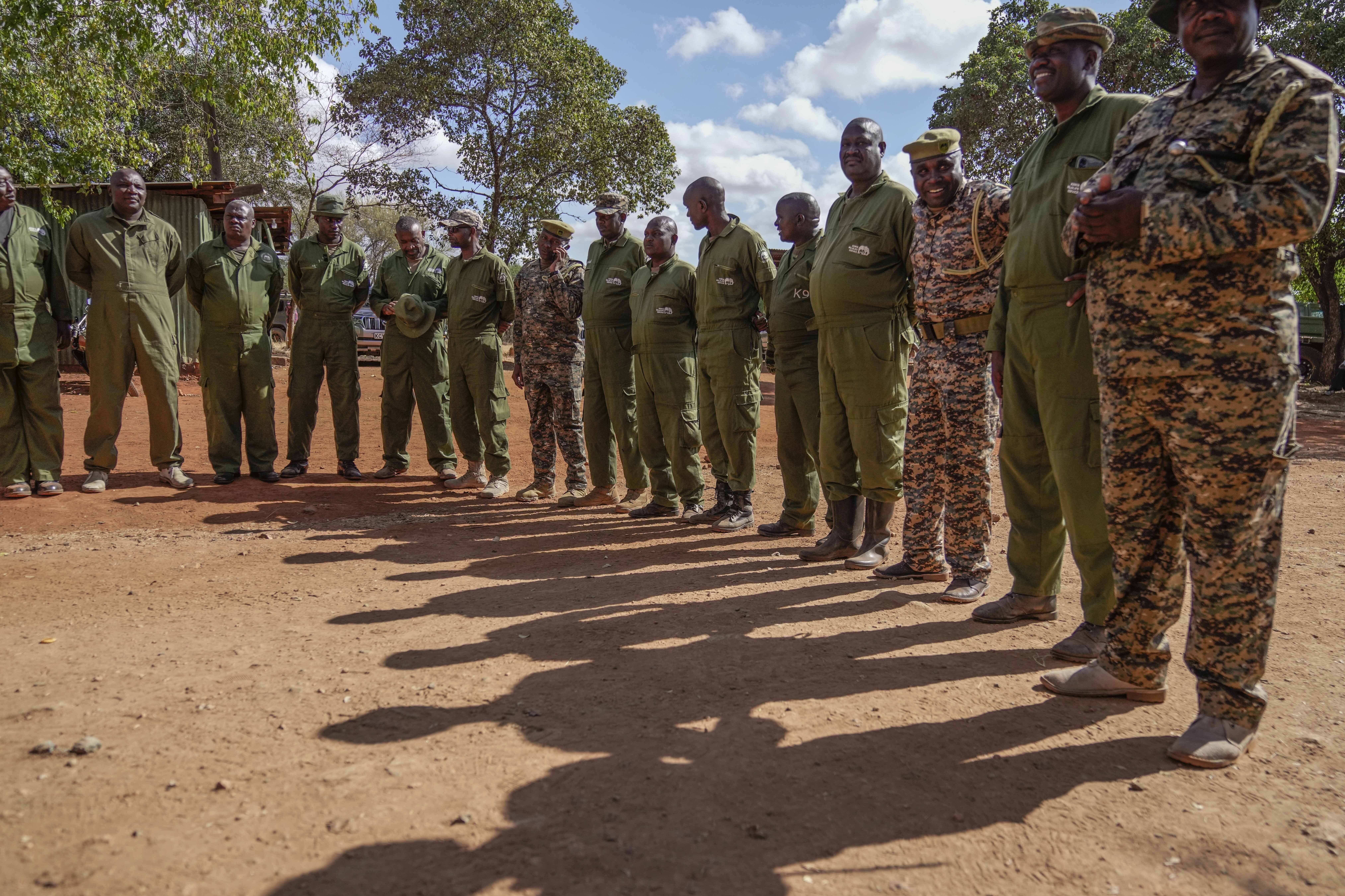 Kenya Wildlife Service rangers and capture team hold a briefing at Mwea National Park, east of the capital Nairobi, Kenya Monday, Oct. 14