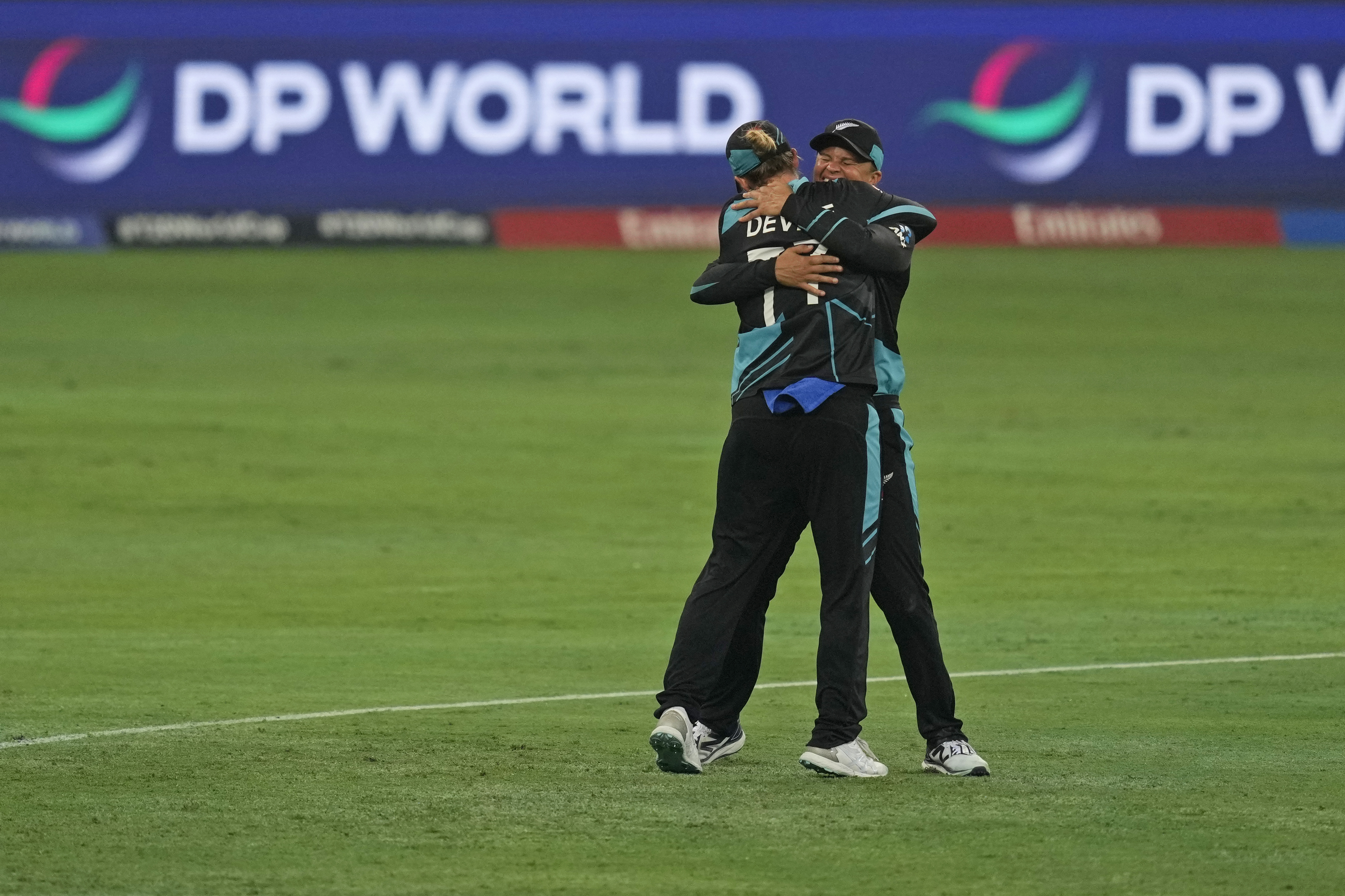 New Zealand's captain Sophie Devine, left, and teammate Suzie Bates celebrate after winning the ICC Women's T20 World Cup 2024 final match against South Africa at Dubai, United Arab Emirates, Sunday, Oct. 20, 2024. (AP Photo/Altaf Qadri)