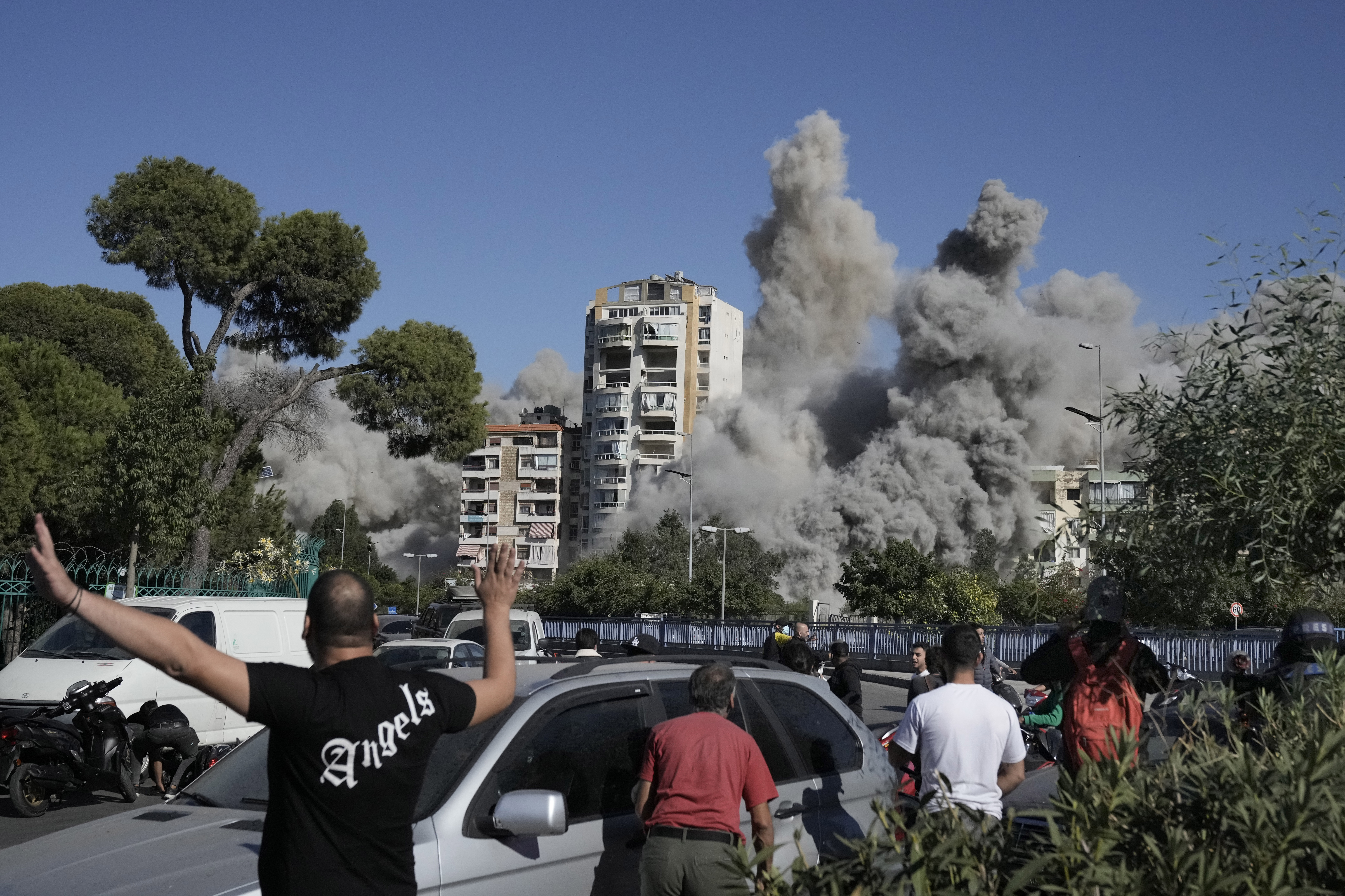 Images capture exact moments an Israeli missile strikes building in Beirut