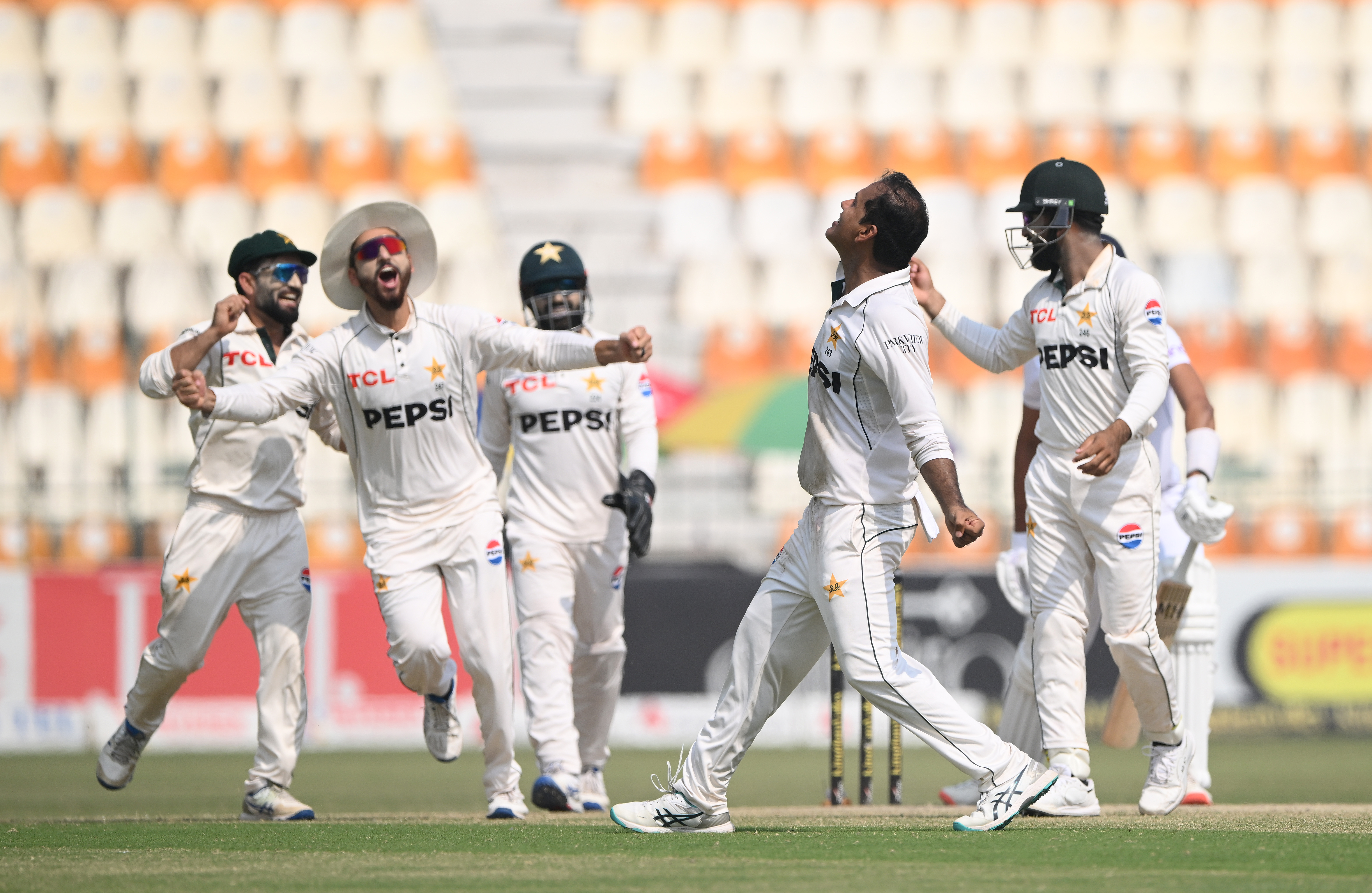 Pakistan bowler Noman Ali celebrates after taking the final wicket of Shoaib Bashir