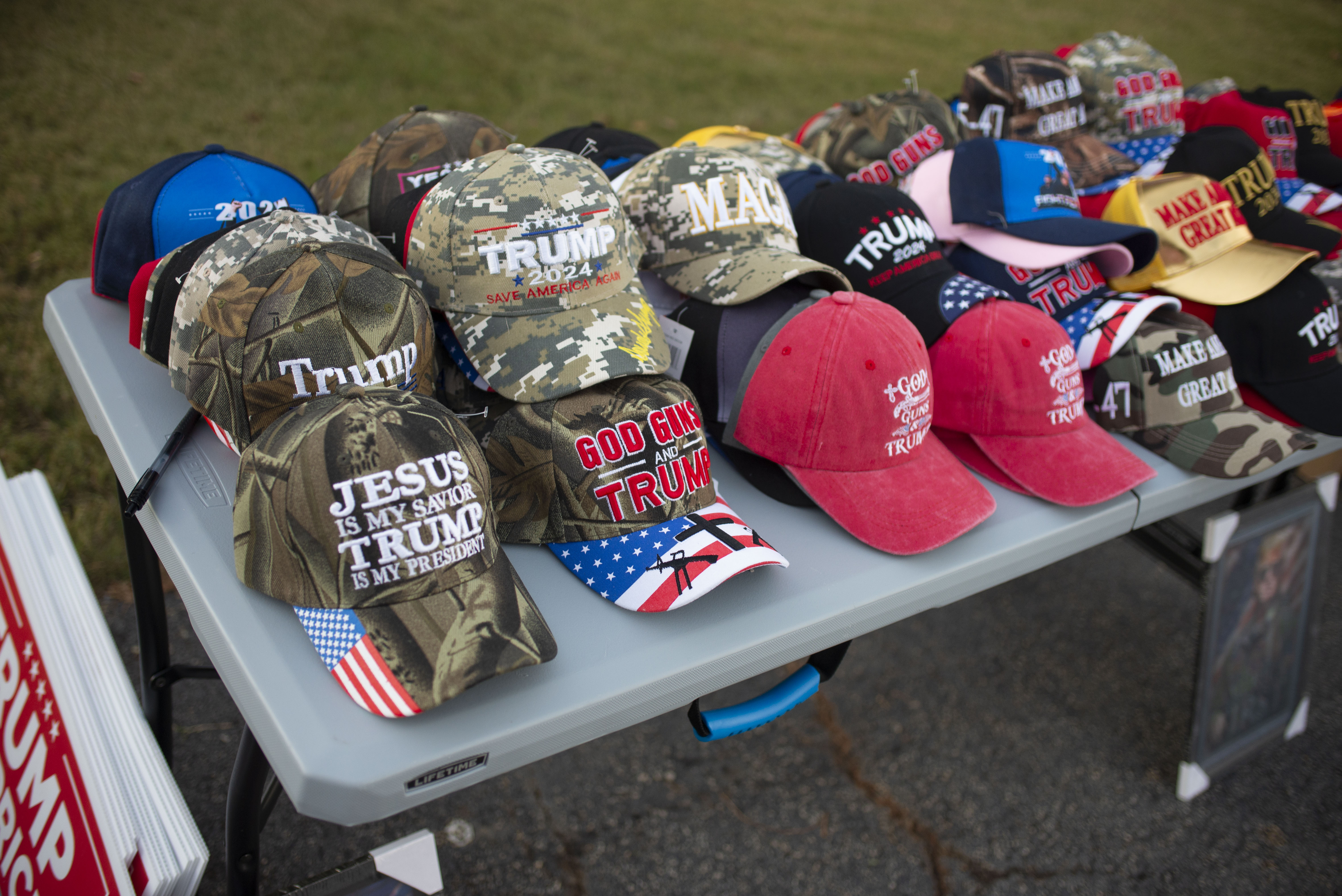 Religious pro-Trump hats are seen at a 'Believers for Trump' event in Austell, Georgia