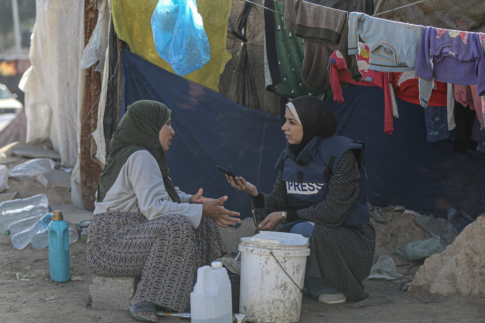 Maram Humaid interviews a displaced woman in a camp in Deir el-Balah as Israel's war on Gaza continues
