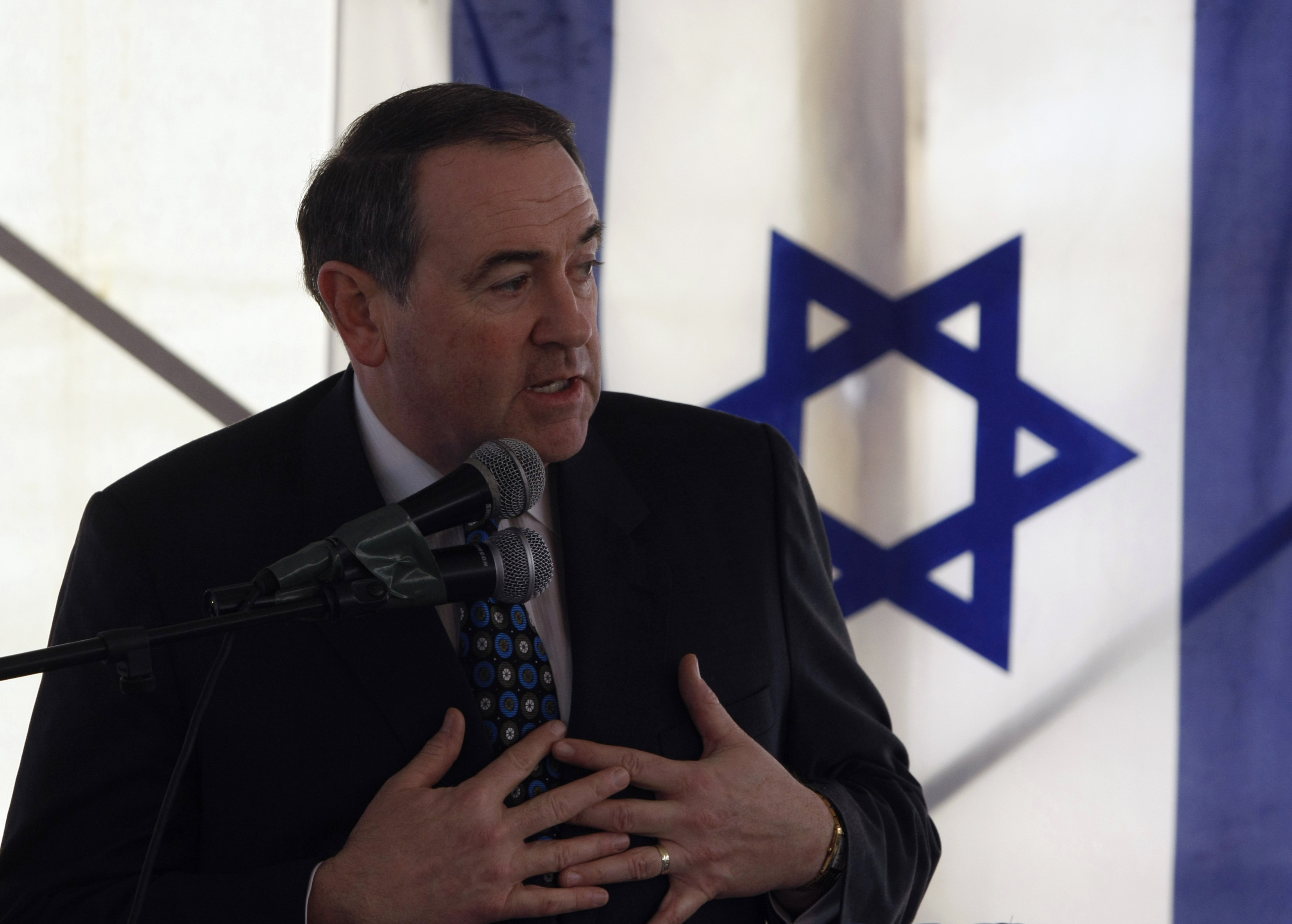 Mike Huckabee, former governor of Arkansas and a leading member of the Republican party, speaks during a cornerstone laying ceremony for the new Jewish neighbourhood of Beit Orot on the Mount of Olives in East Jerusalem January 31, 2011. REUTERS/Baz Ratner (JERUSALEM - Tags: POLITICS BUSINESS)