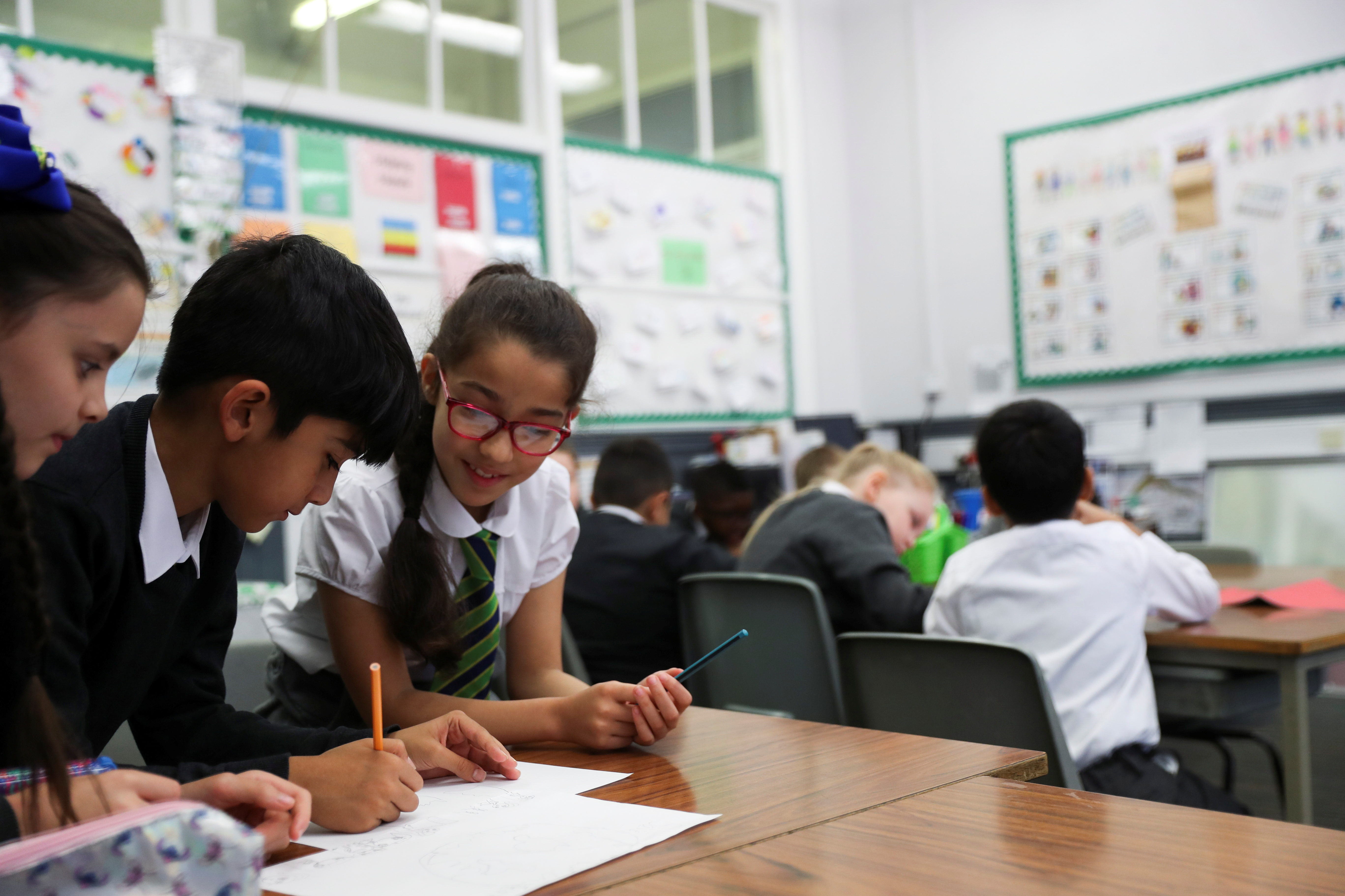 Pupils at St Conval's Primary School learn about climate change ahead of U.N. climate conference COP26, in Glasgow, Scotland, Britain October 19, 2021. Picture taken October 19, 2021. REUTERS/Russell Cheyne