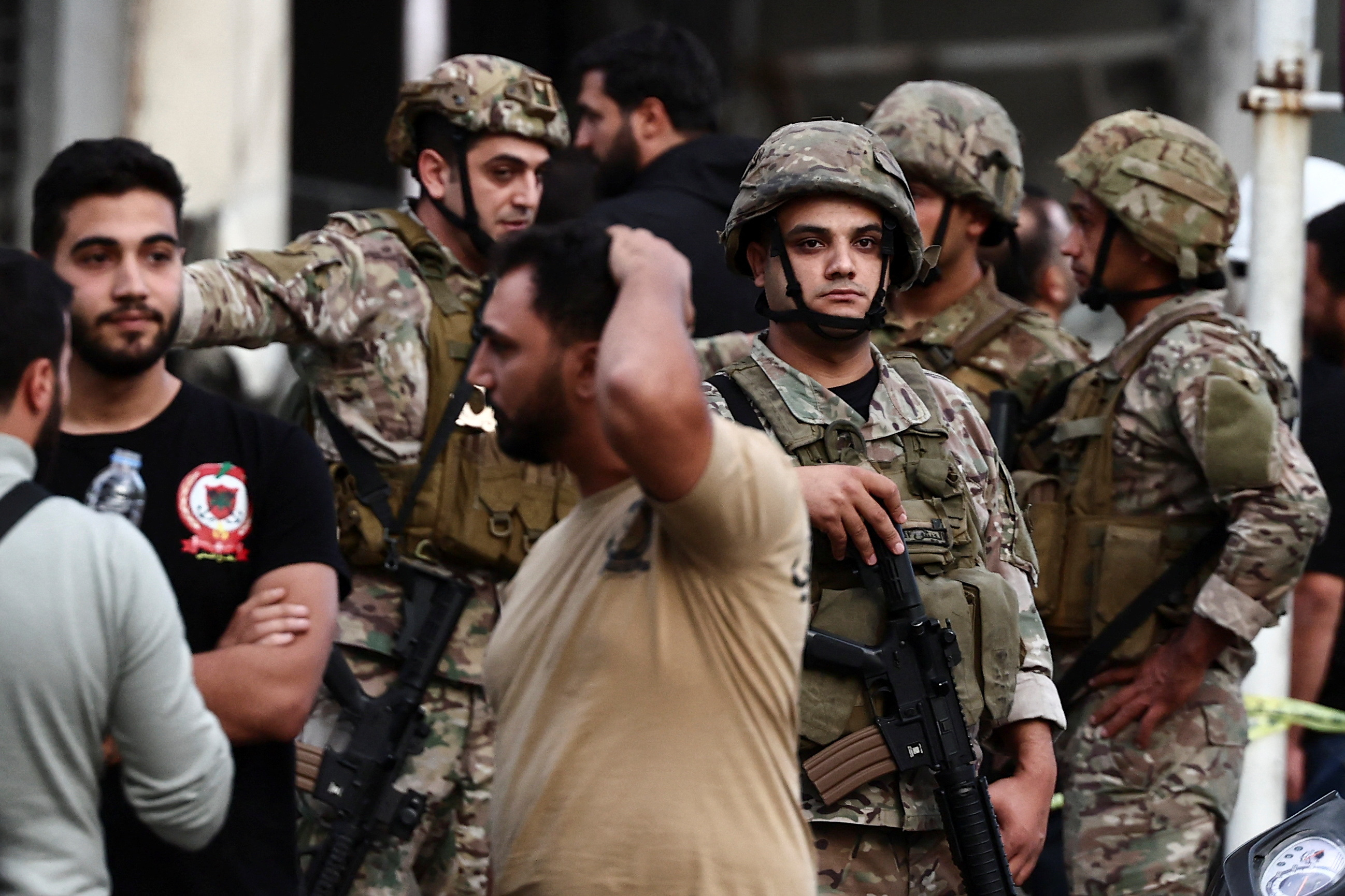 Lebanese soldiers stand guard in the aftermath of an Israeli strike on Beirut's southern suburbs, amid the ongoing hostilities between Hezbollah and Israeli forces, in Beirut, Lebanon, November 2, 2024. REUTERS/Yara Nardi