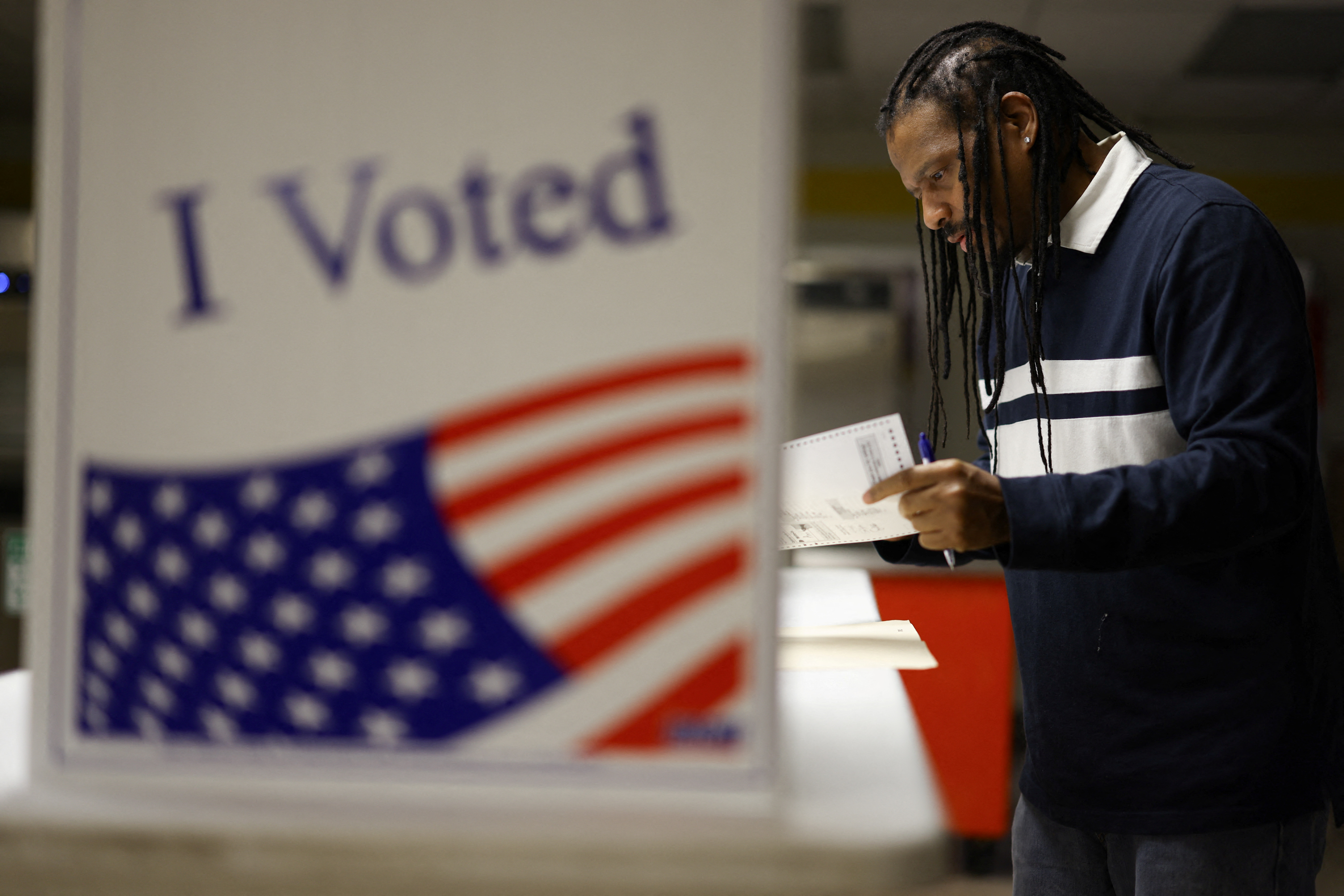 A man votes in the 2024 U.S. presidential election on Election Day, at Pittsburgh Manchester School in Pittsburgh, Pennsylvania, U.S., November 5