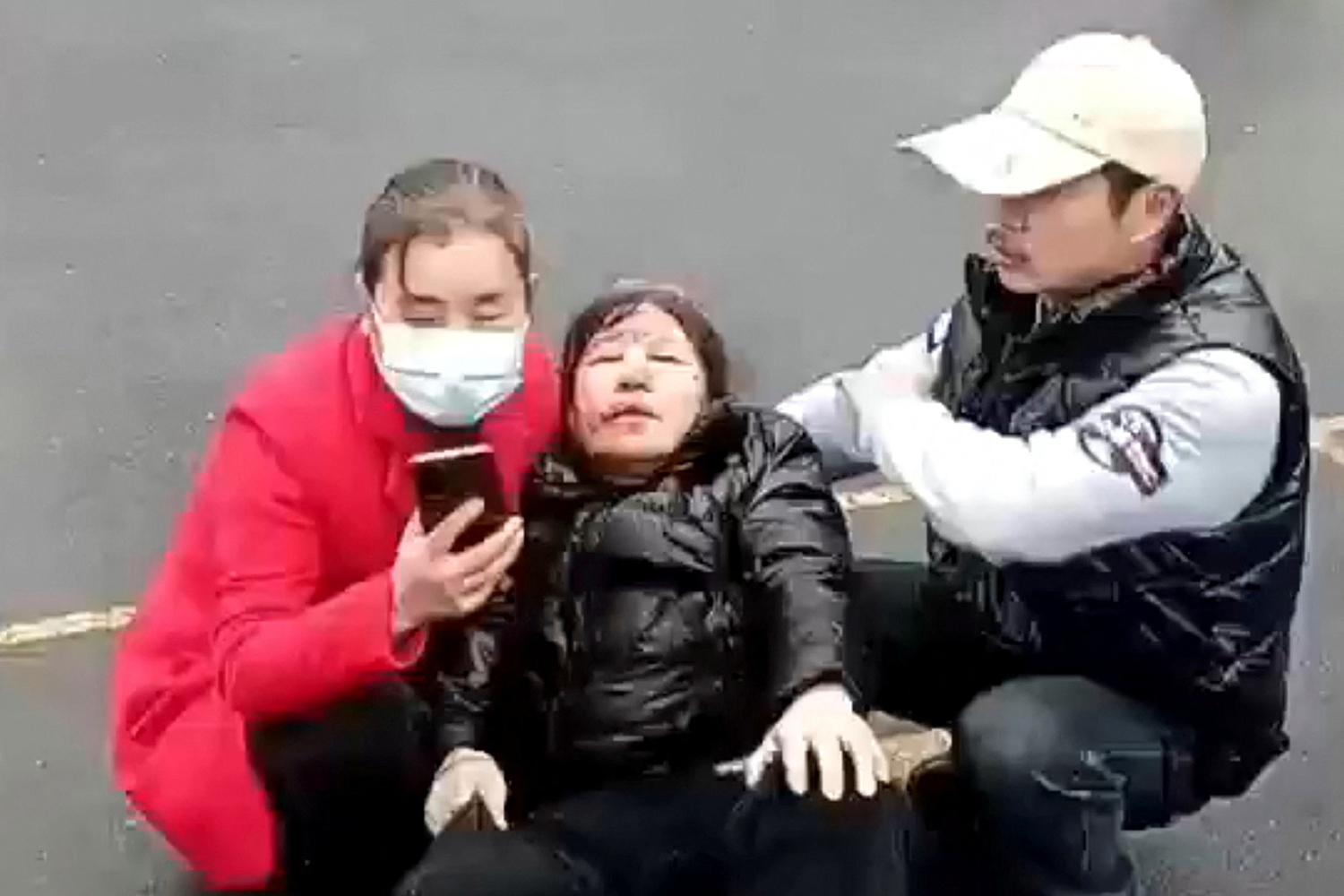 casualty is assisted following a vehicle collision outside a primary school in Changde