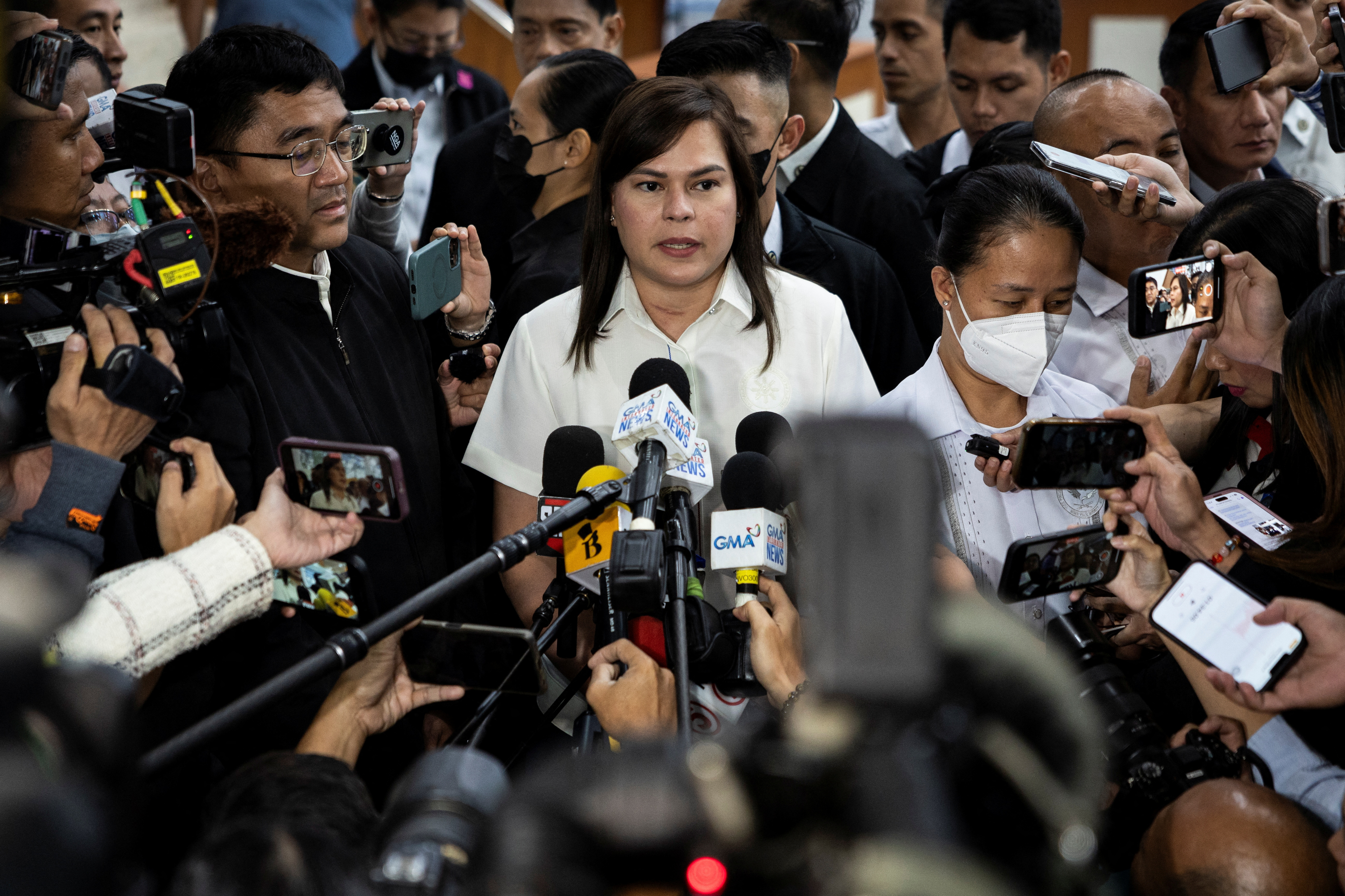 Philippine Vice President Sara Duterte speaks to the media.