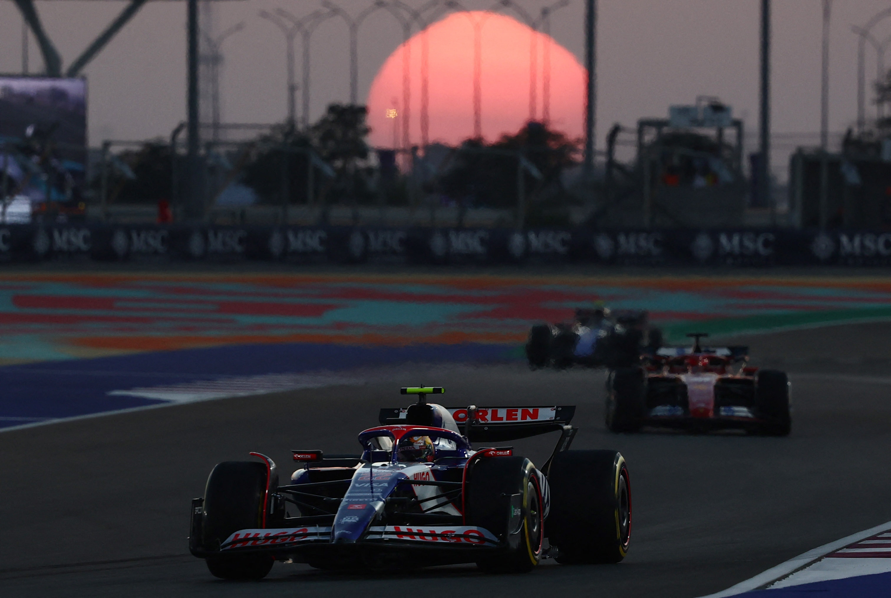 Formula One F1 - Qatar Grand Prix - Lusail International Circuit, Lusail, Qatar - November 29, 2024 RB's Yuki Tsunoda and drivers during practice REUTERS/Jakub Porzycki