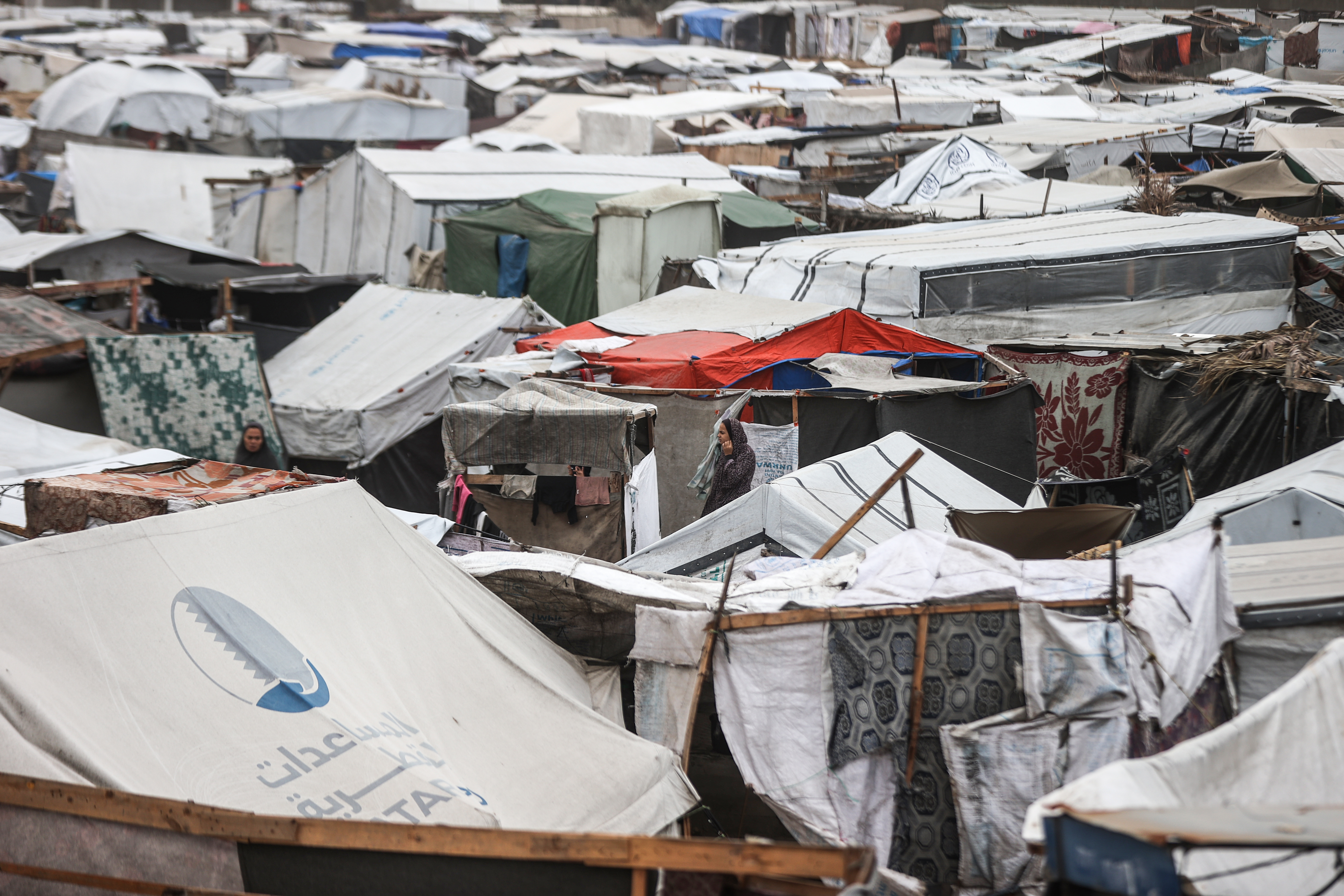 Palestinians, forced to migrate by Israeli attacks, struggle with rain and cold weather