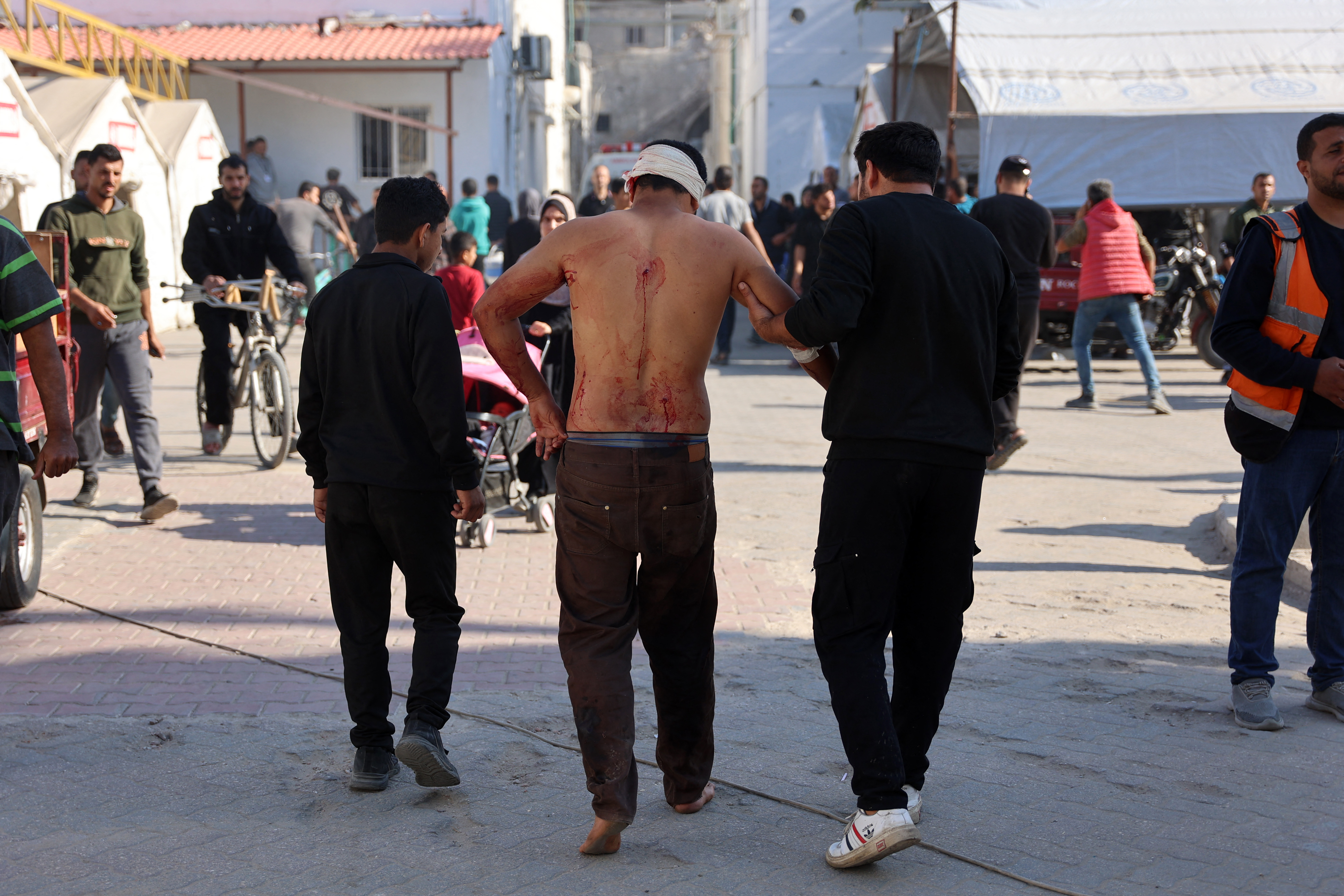 At least 46 Palestinians killed in Israeli strikes, hospital hit