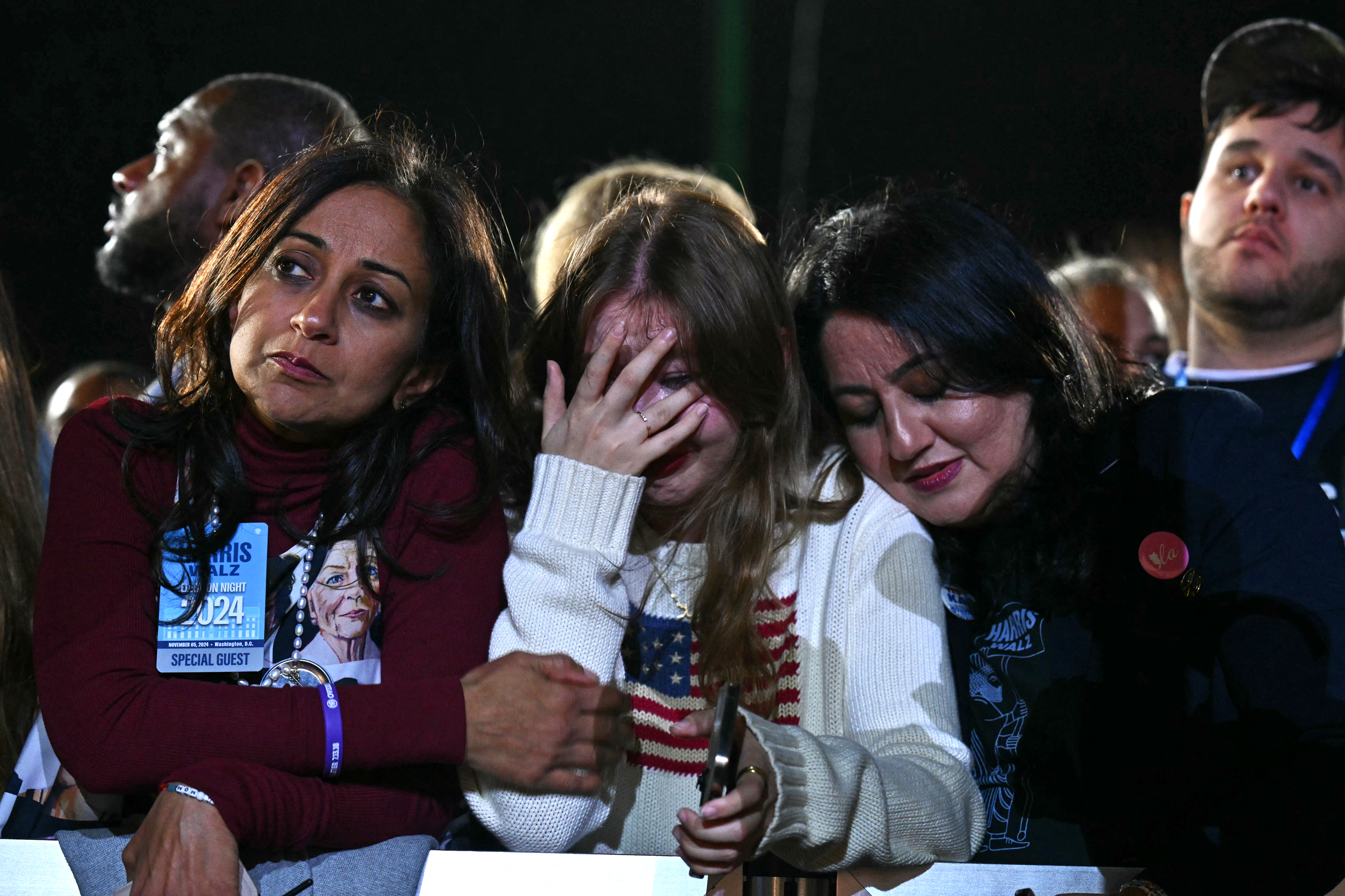 Supporters react to election results during an election night event for US Vice President and Democratic presidential candidate Kamala Harris at Howard University in Washington, DC, on November 5