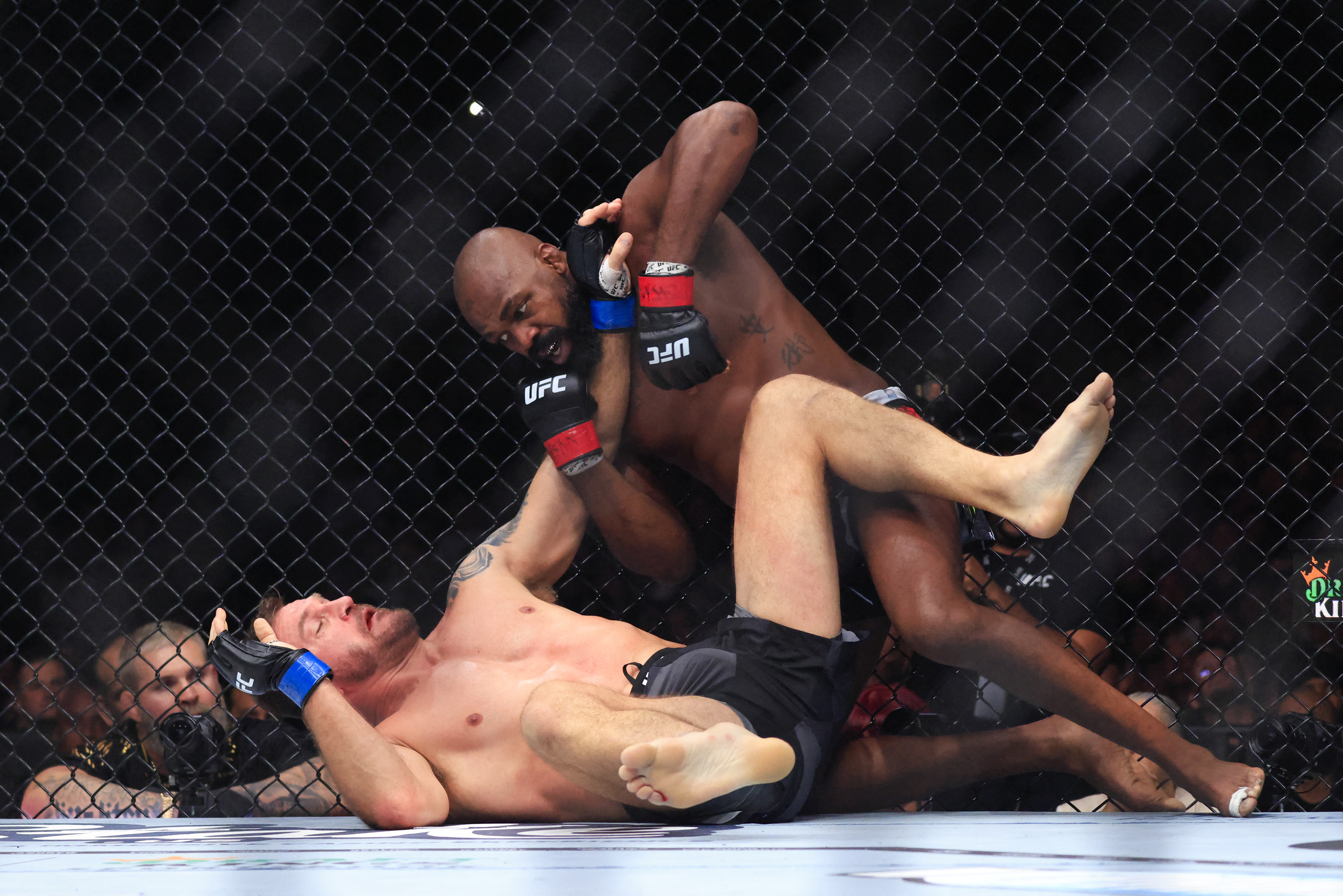 UFC Heavyweight Champion Jon Jones (R) fights challenger Stipe Miocic during their heavyweight title bout at Madison Square Garden in New York, on November 16, 2024. (Photo by Kena Betancur / AFP)