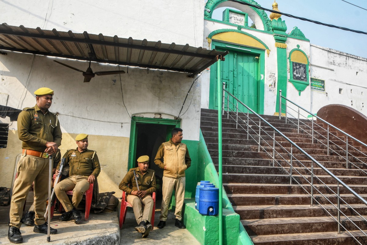 Police are deployed outside the Shahi Jama Masjid following religious violence in Sambhal on November 25