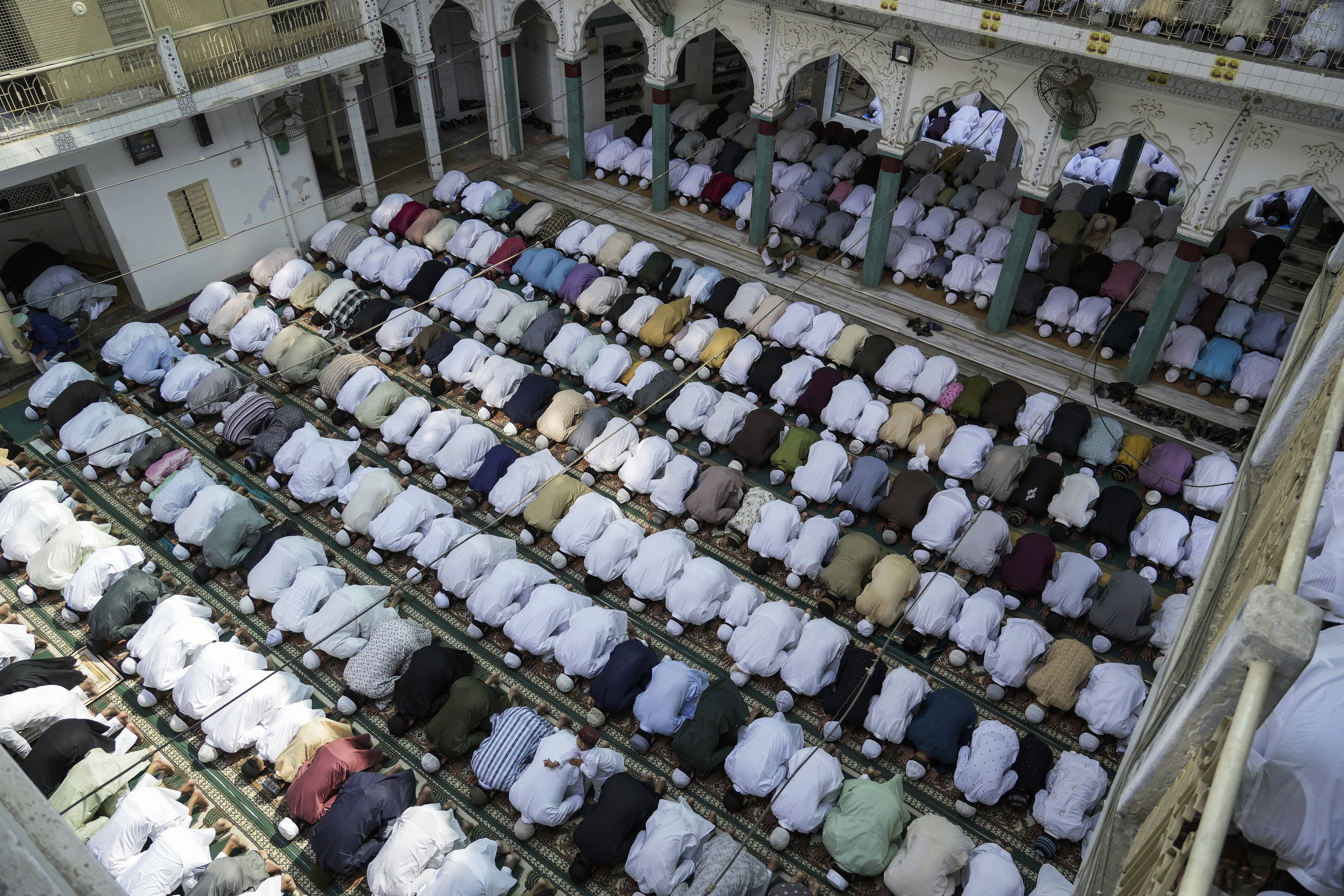 Muslims offer Eid al-Fitr prayers at the Vasi Ullah Mosque in Prayagraj, Uttar Pradesh, India