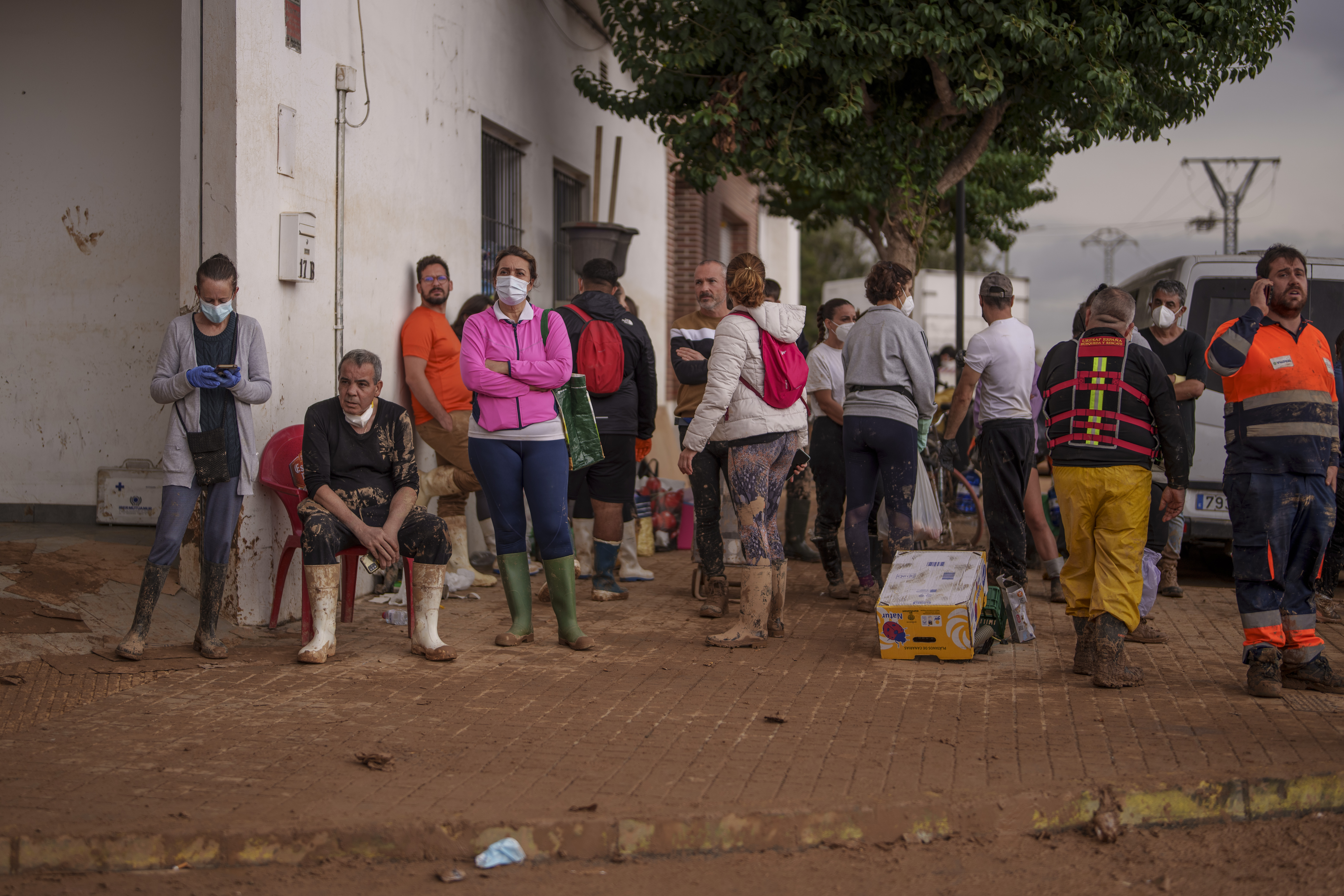 Heavy rains in Barcelona disrupt rail service as troops search for more flood victims in Valencia