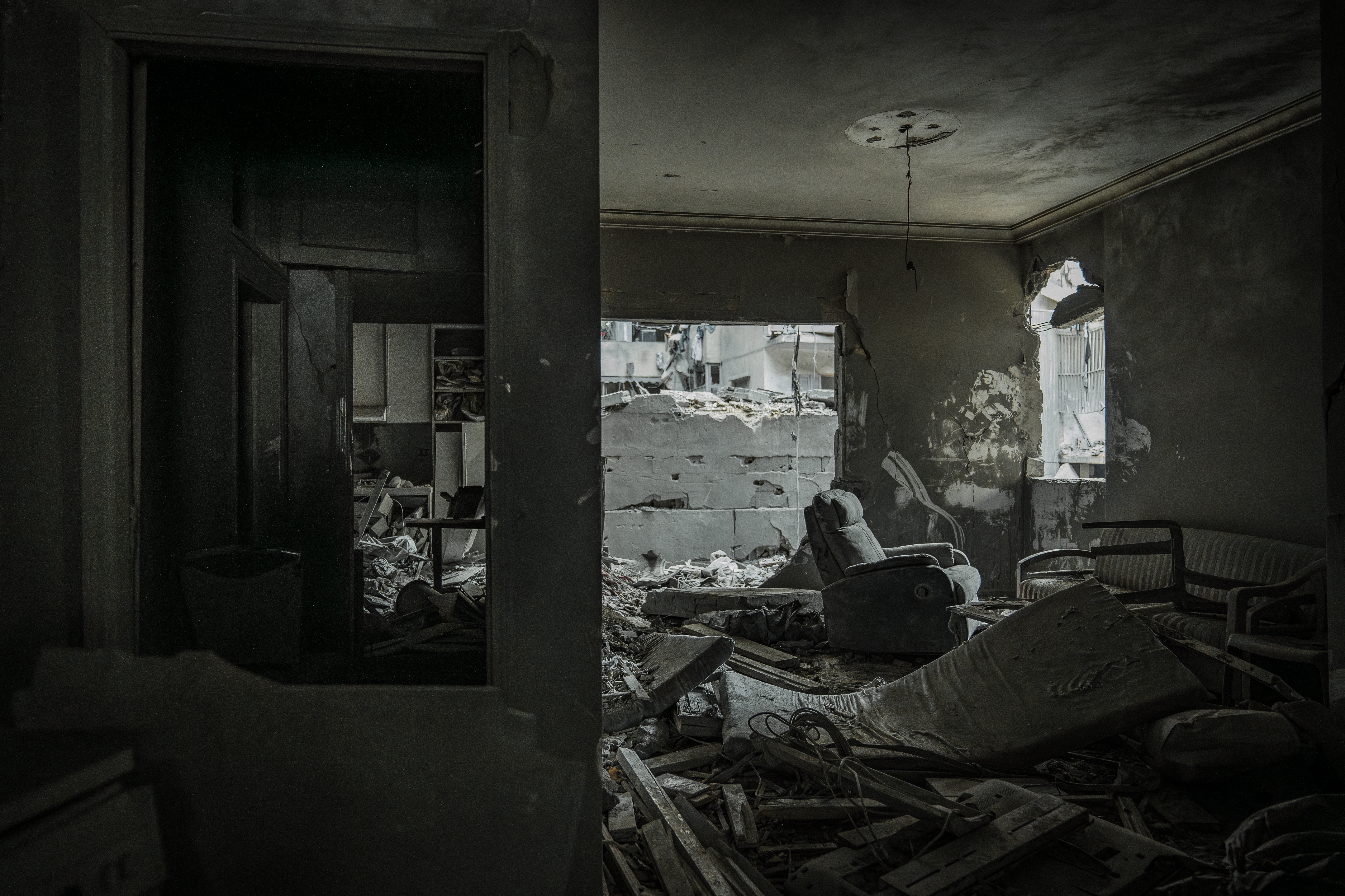 A view on a living room destroyed by israeli bombings