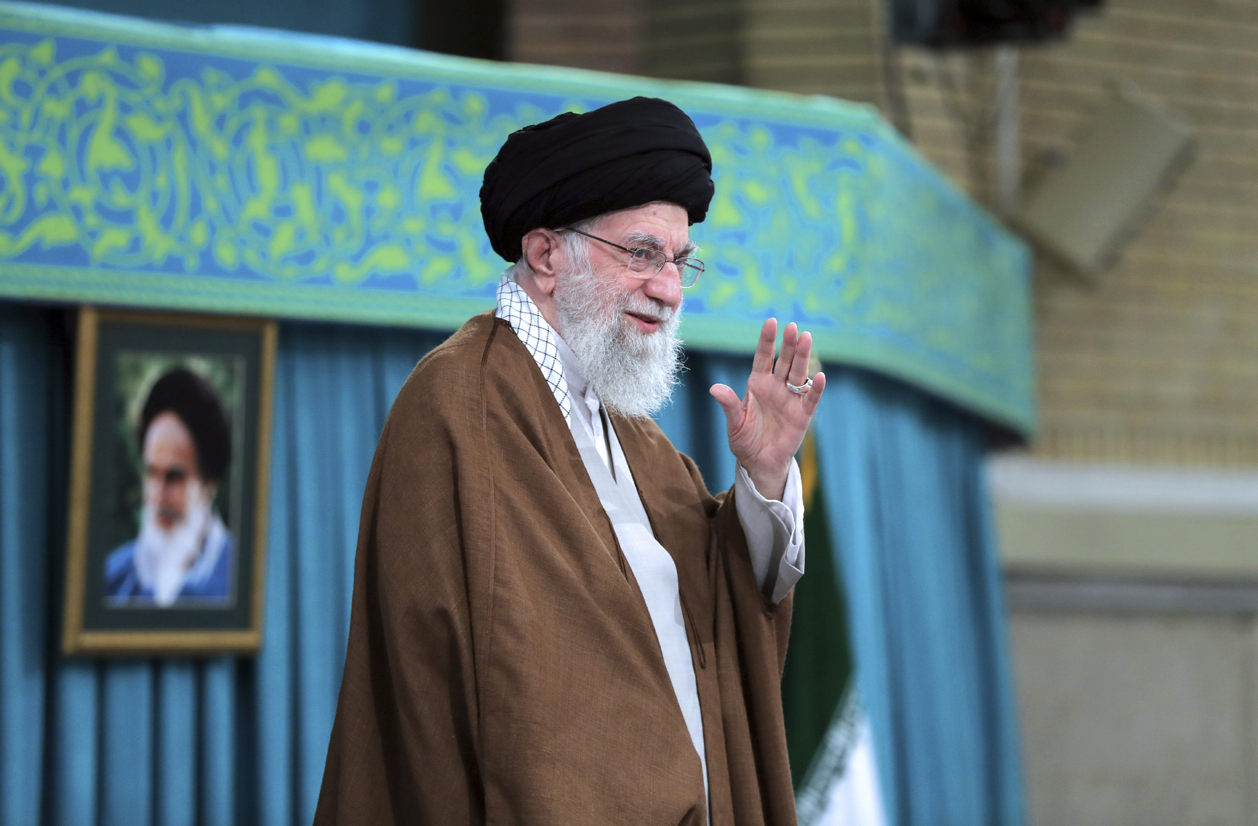 Supreme Leader Ayatollah Ali Khamenei waves to the crowd in a meeting in Tehran, Iran, on October 27, 2024.