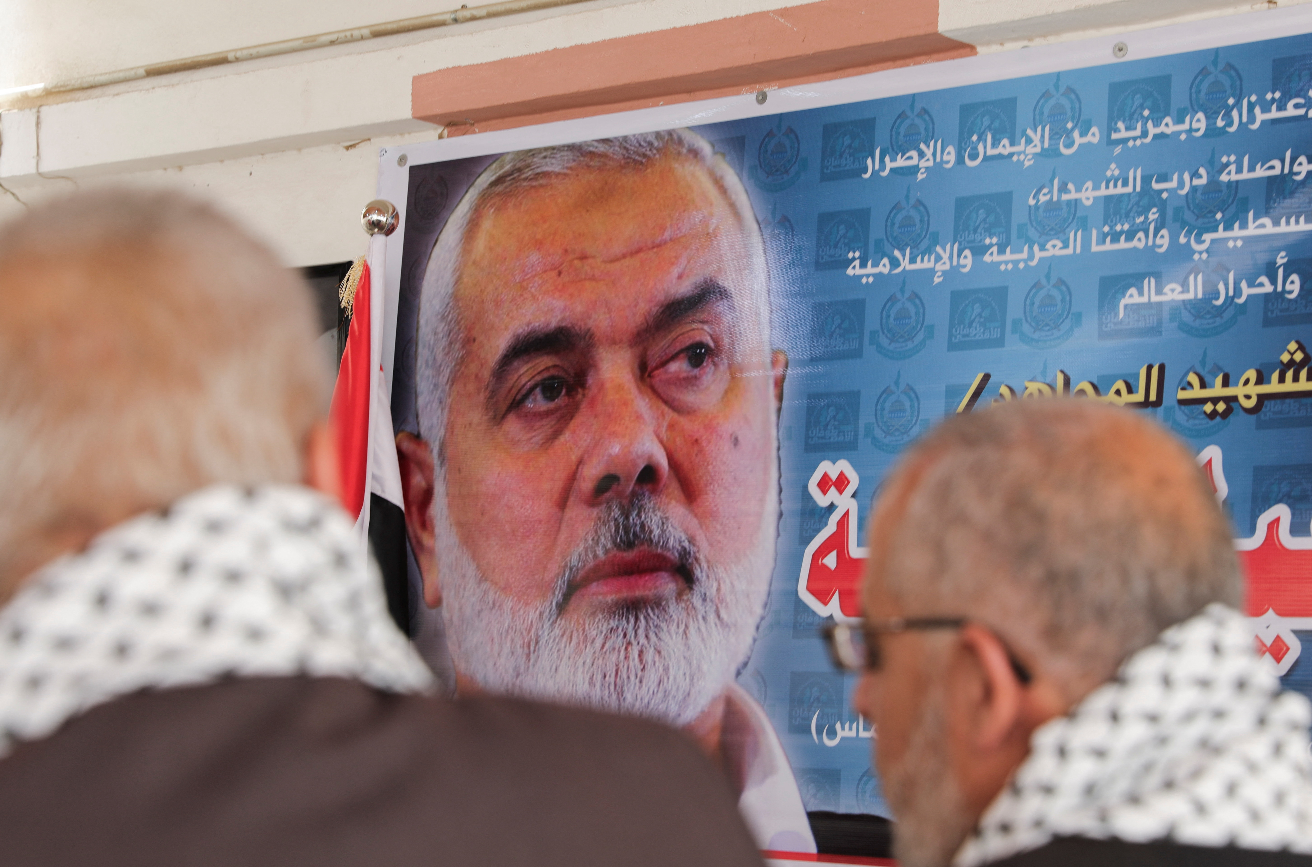 A poster of assassinated Hamas leader Ismail Haniyeh is seen at the Hamas office during a visit by officials in the Houthi-led government to the Hamas office in Sanaa, Yemen August 19, 2024. REUTERS/Khaled Abdullah