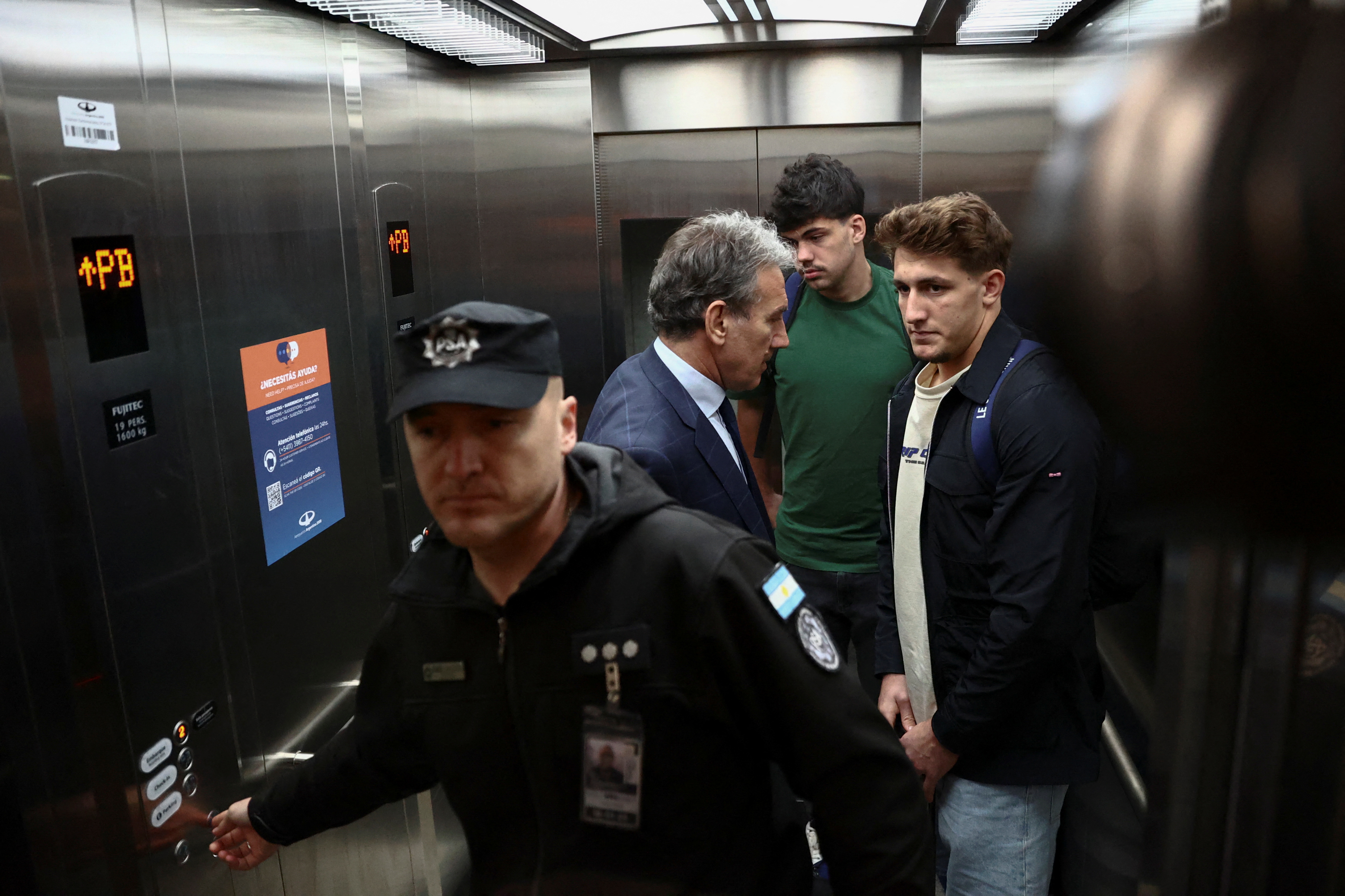 France rugby players Hugo Auradou and Oscar Jegou with police.