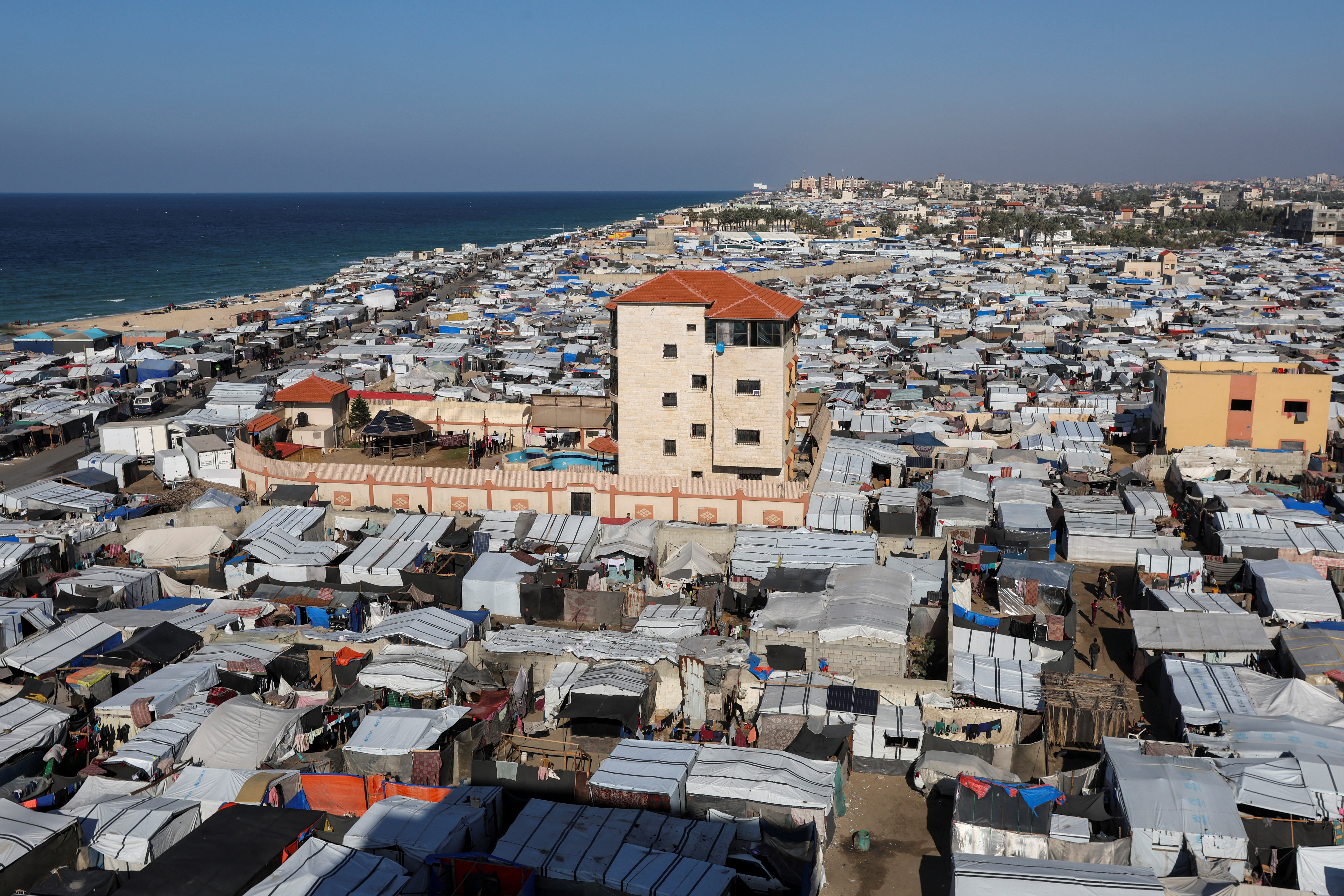 Displaced Palestinians shelter at a large tent camp in Deir el-Balah in the central Gaza Strip December 1, 2024. [Ramadan Abed/Reuters] (Reuters)