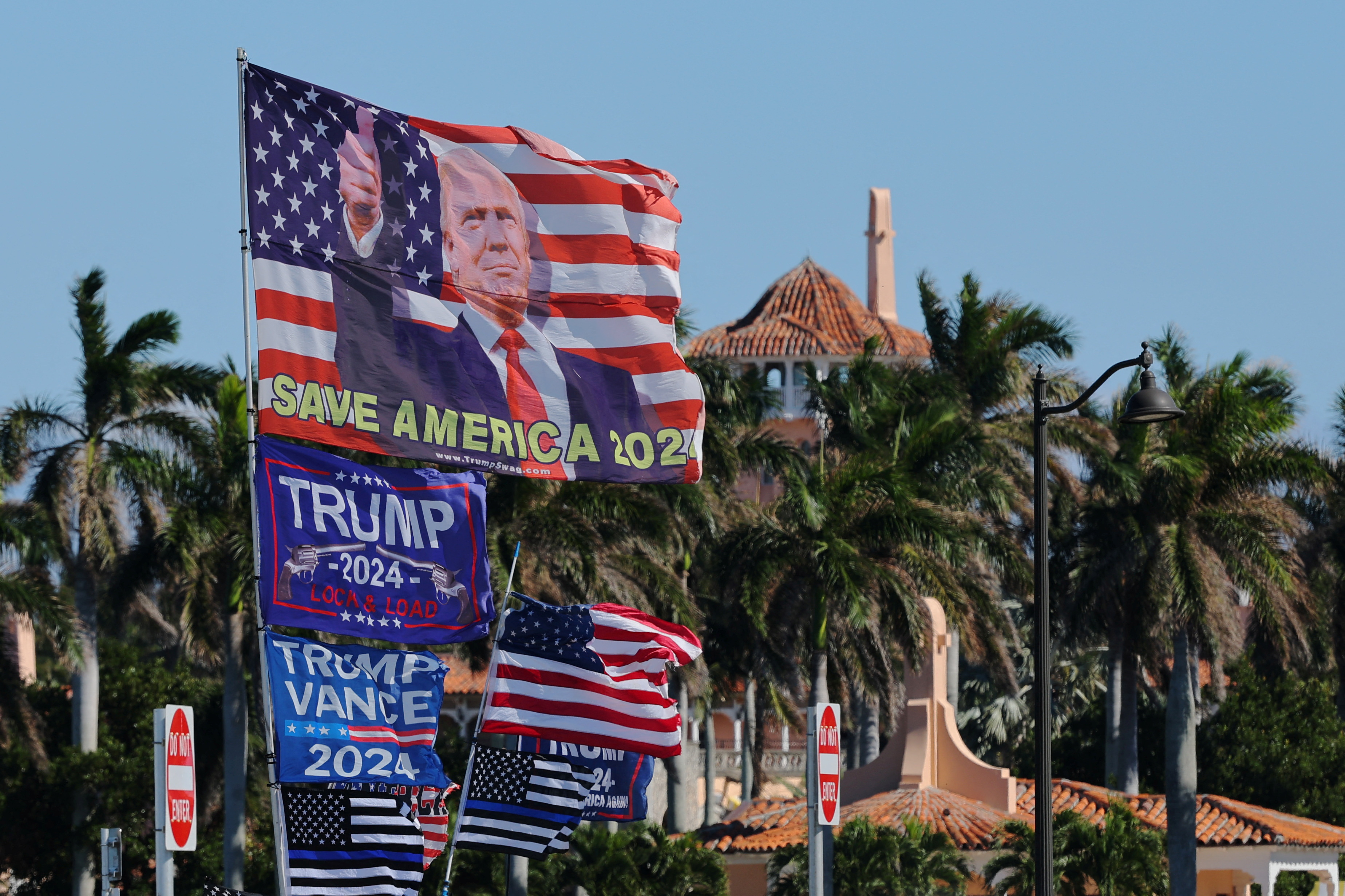 Supporters gather outside U.S. President-elect Donald Trump's residence at Mar-a-Lago in Palm Beach, Florida, U.S., December 3, 2024. REUTERS/Brian Snyder