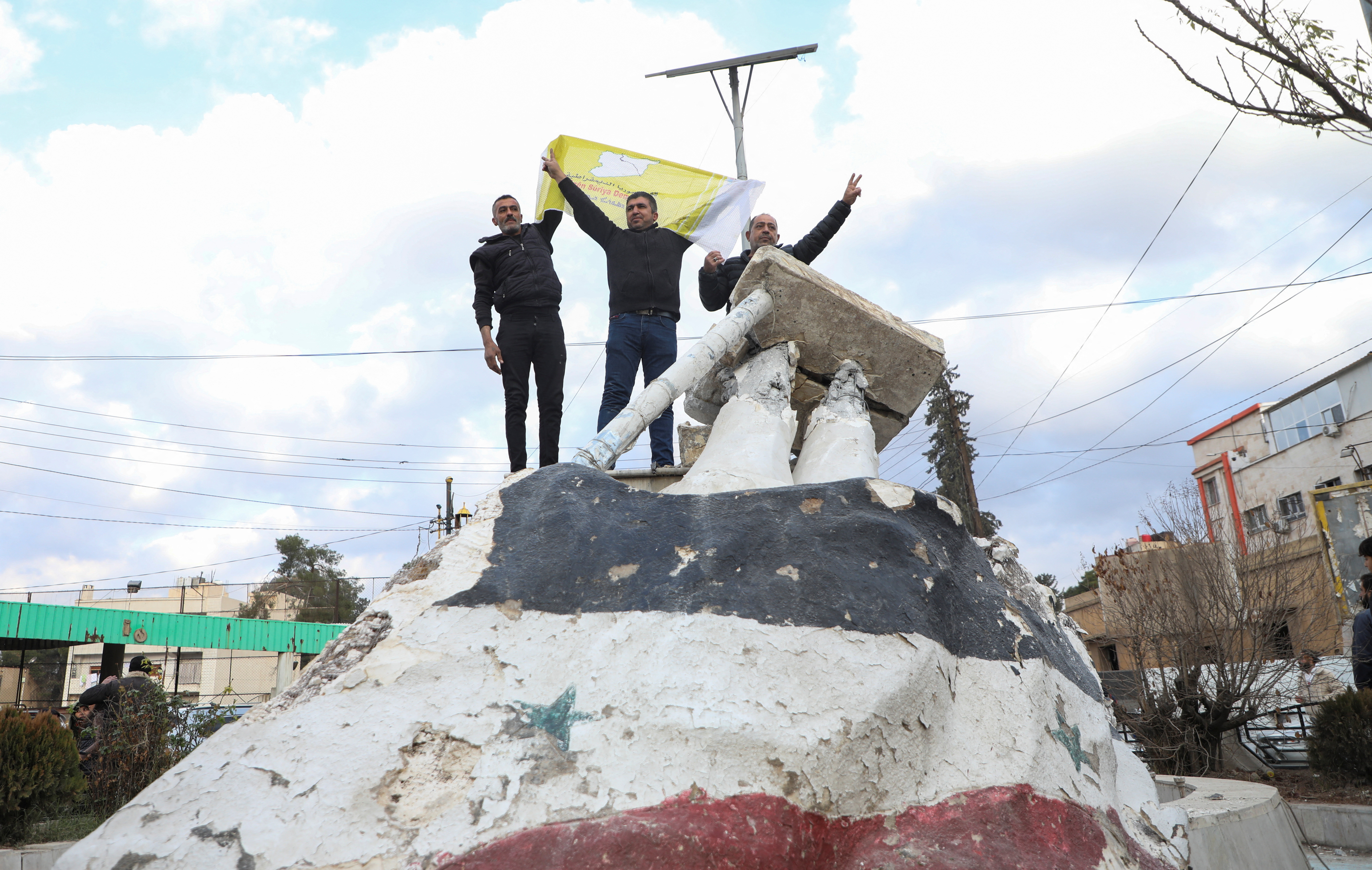 people celebrate in in Qamishli