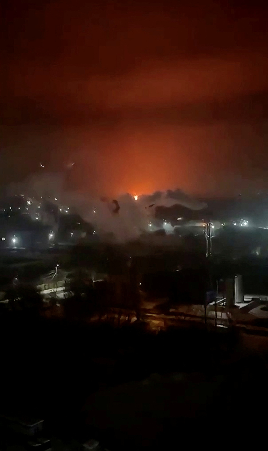Fire and smoke rise from an oil depot in Russia's Bryansk