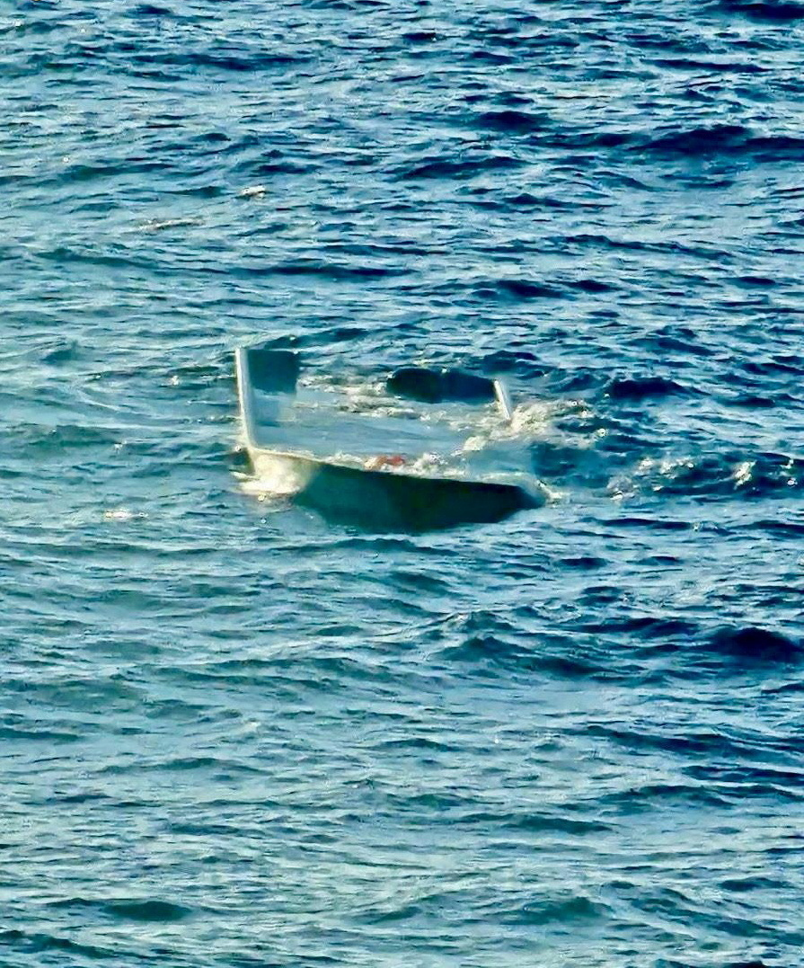 A view shows a capsized migrant boat off the island of Gavdos, Greece, December 14, 2024. Hellenic Coast Guard/Handout via REUTERS ATTENTION EDITORS - THIS IMAGE HAS BEEN PROVIDED BY A THIRD PARTY. NO RESALES. NO ARCHIVES. BEST QUALITY AVAILABLE