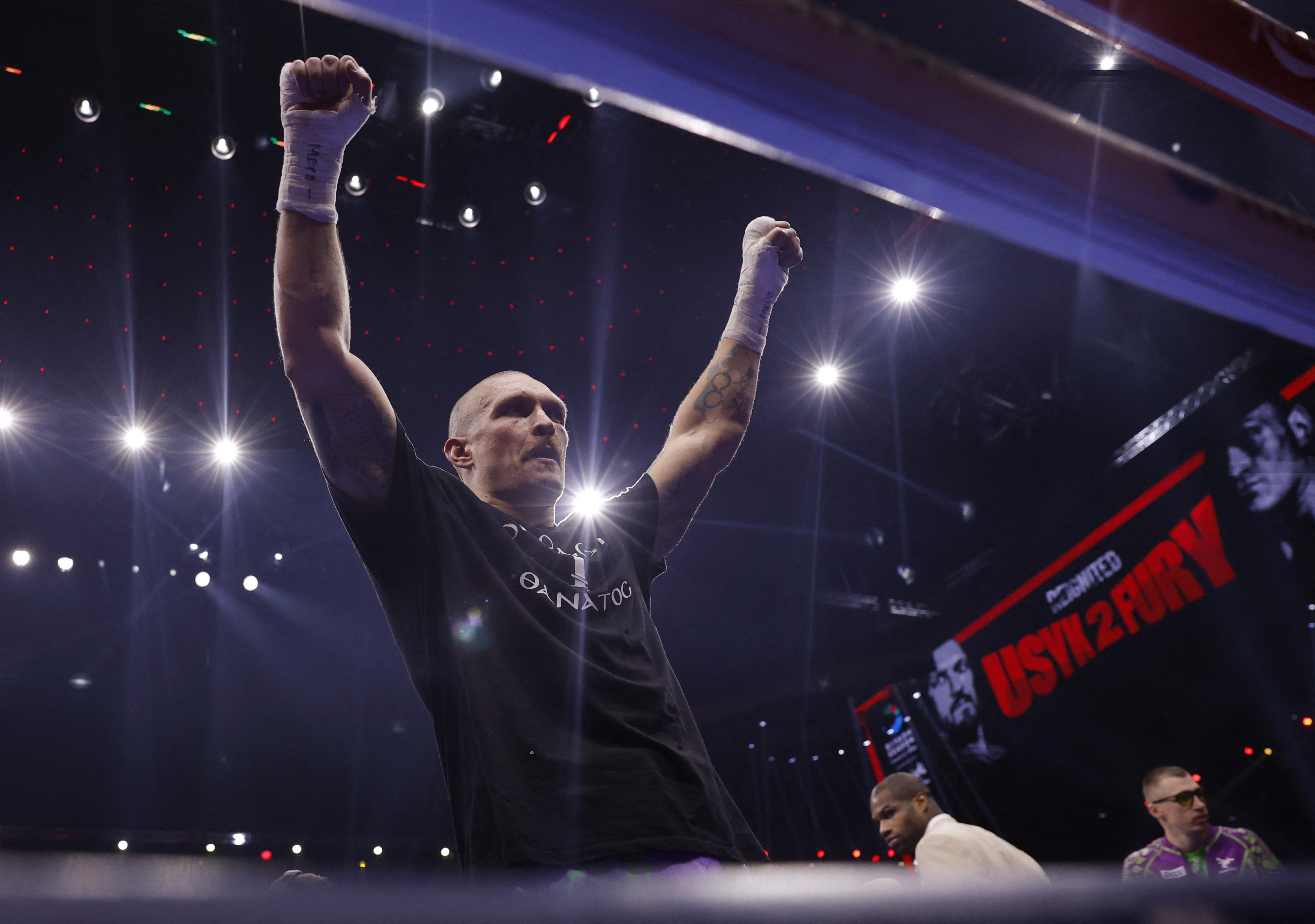 Boxing - Oleksandr Usyk v Tyson Fury - Heavyweight World Title - Kingdom Arena, Riyadh, Saudi Arabia - December 22, 2024 Oleksandr Usyk celebrates after winning the Heavyweight World Title Action Images via Reuters/Andrew Couldridge