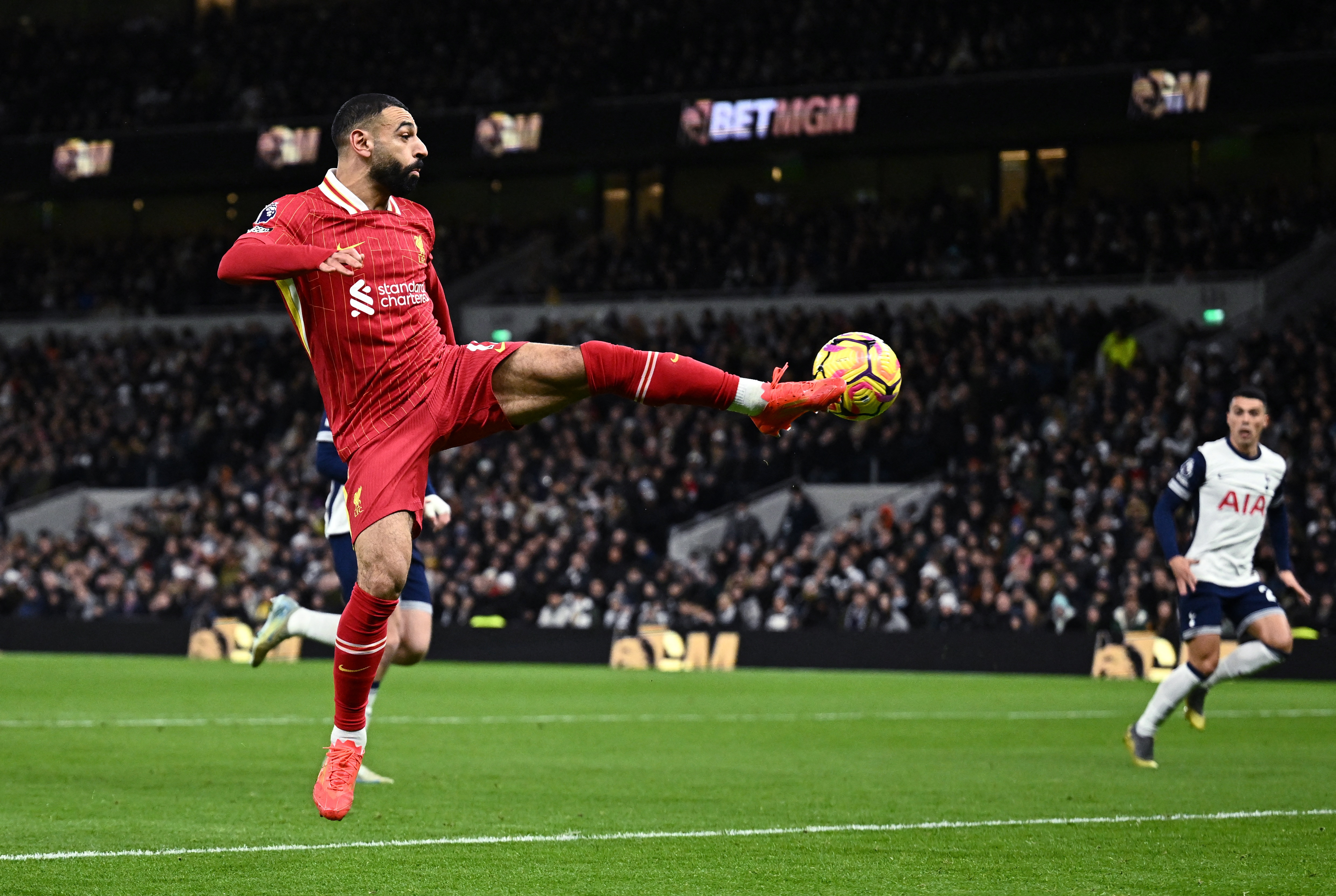 Mo Salah strikes ball.
