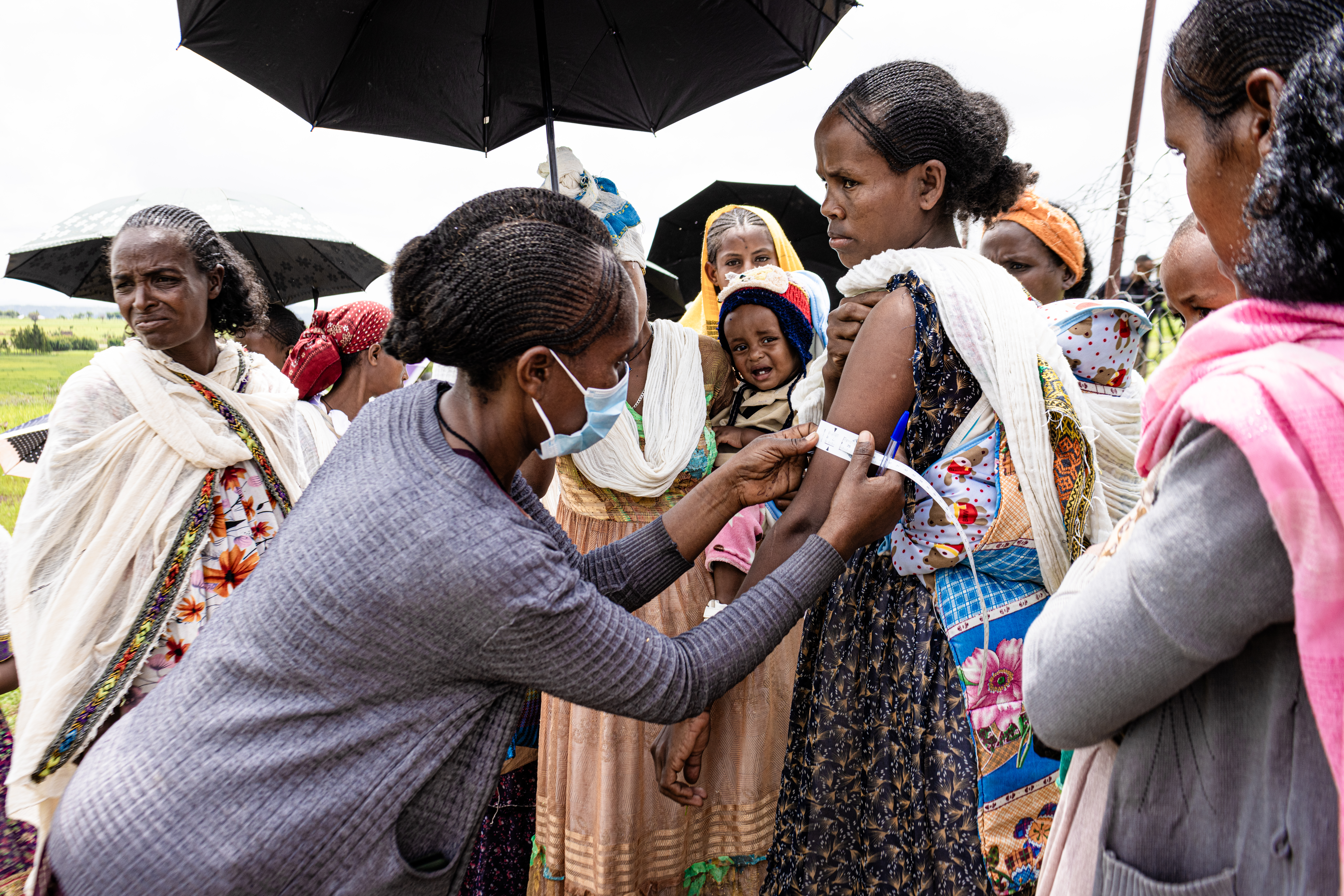 Doctor examining woman