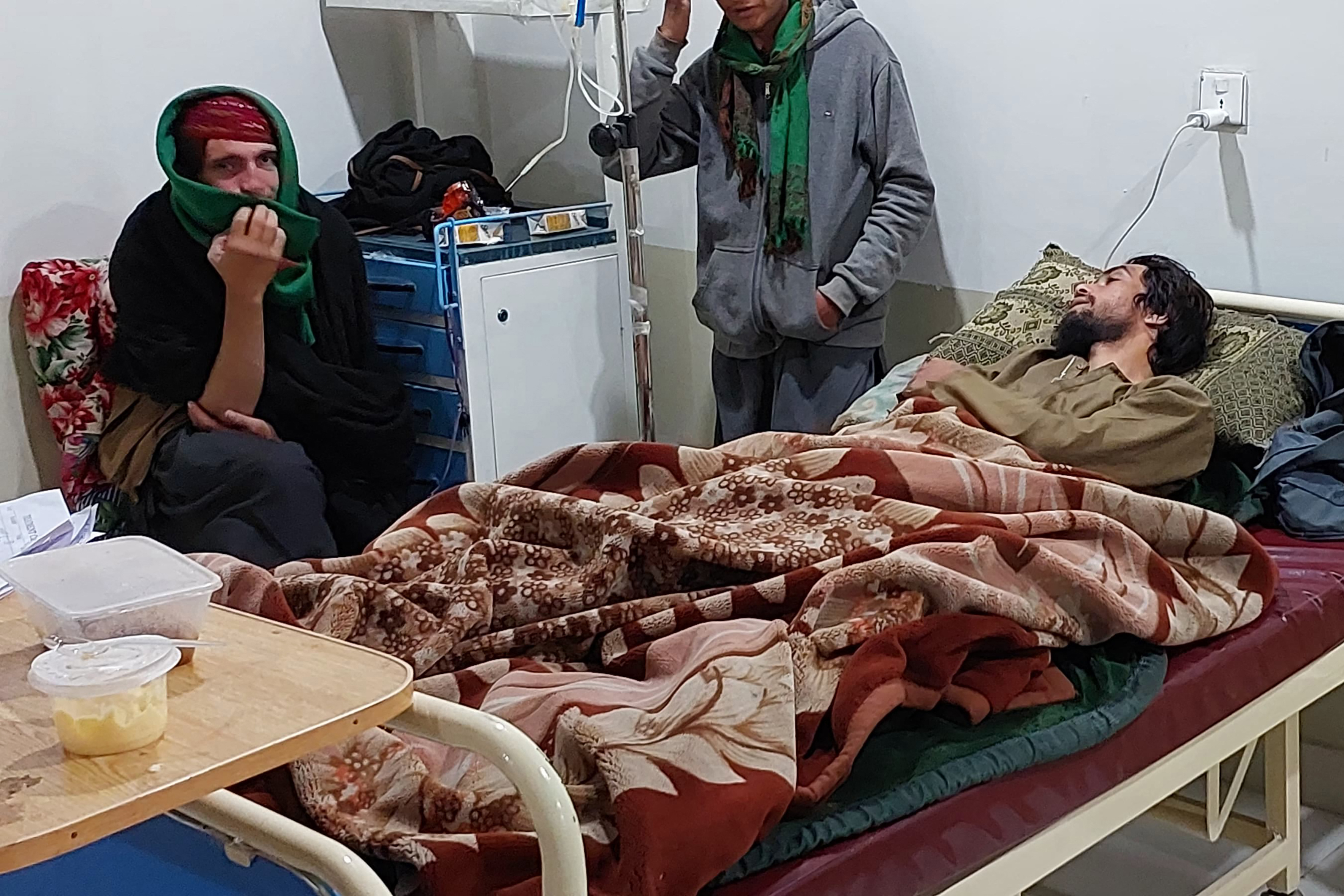 An injured victim is treated at a hospital after he was wounded in sectarian attacks in Kurram district in Parachinar, the mountainous Khyber Pakhtunkhwa [Dilawer Khan / AFP]