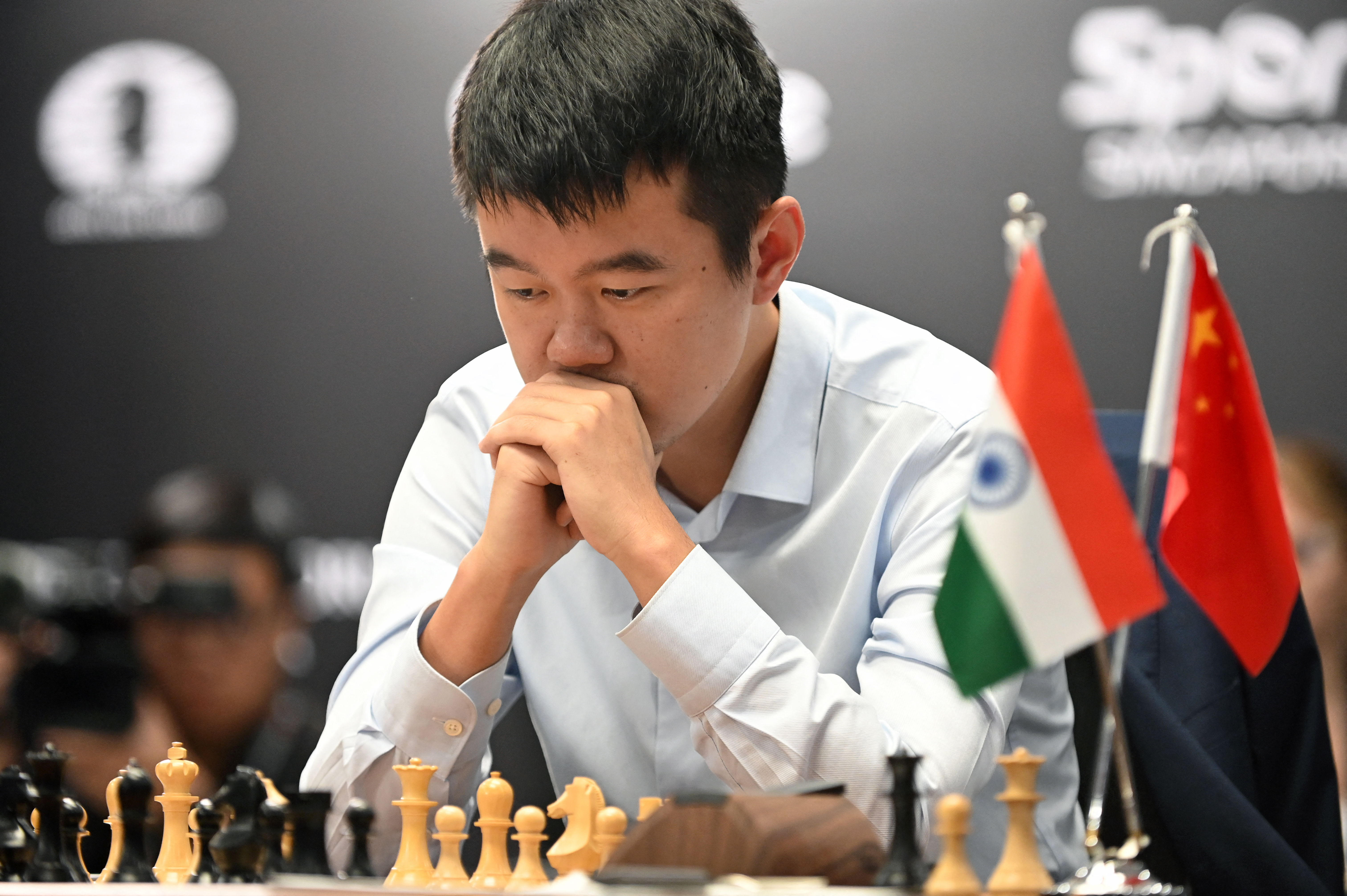 Chess player Ding Liren reacts.