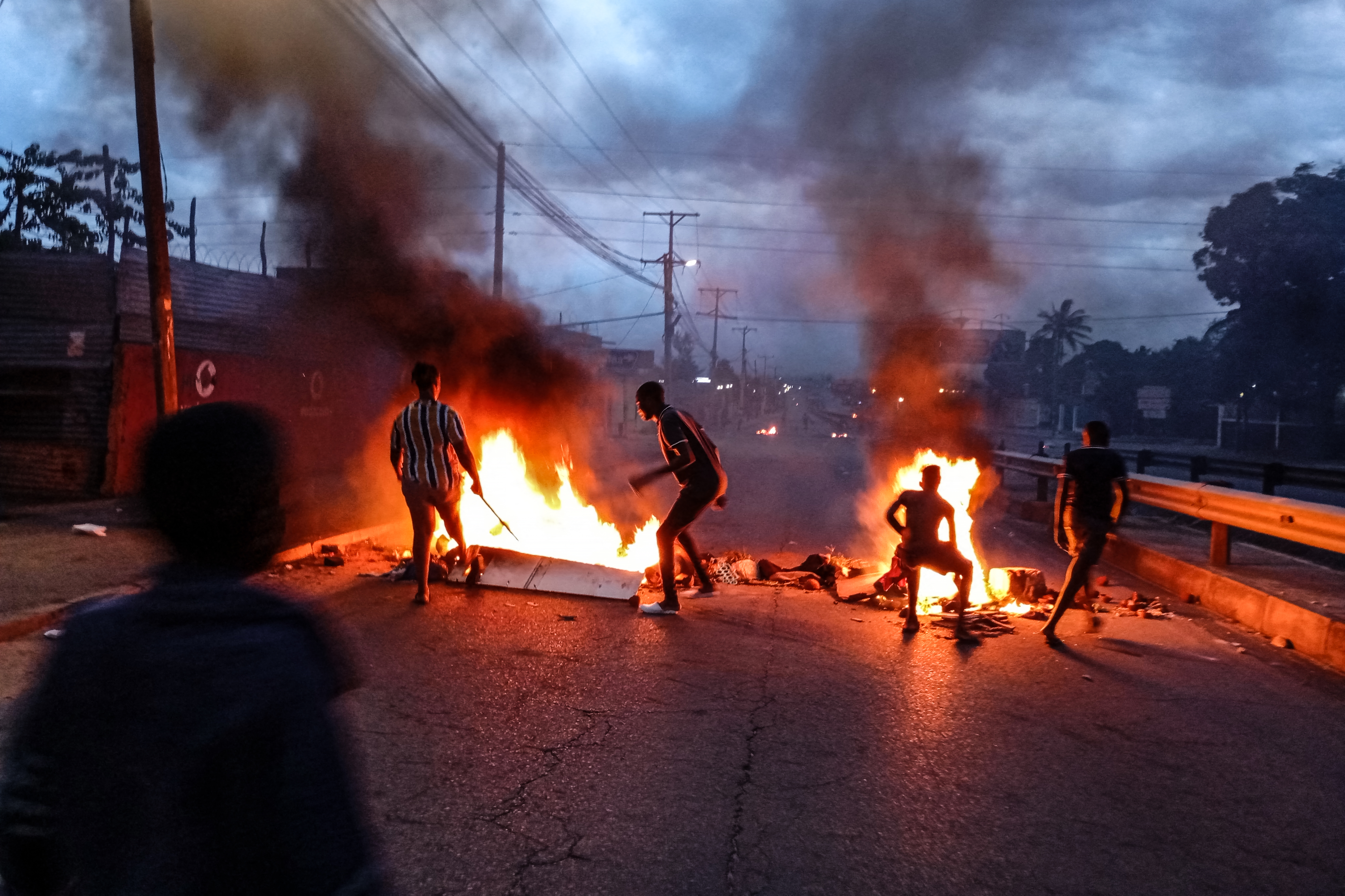 Mozambique demonstrators burn tires