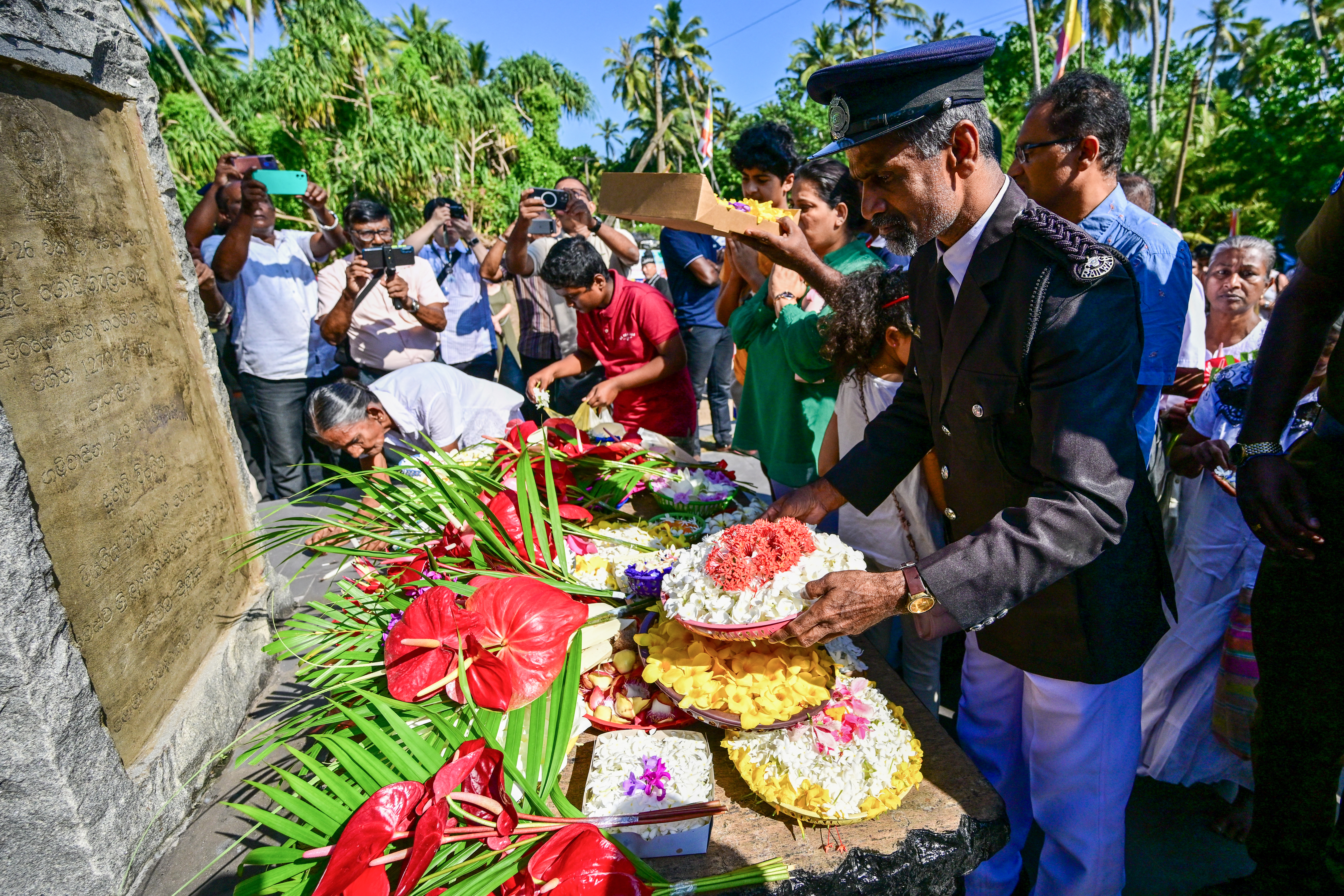 Tearful Asia mourns 220,000 tsunami victims on 20th anniversary
