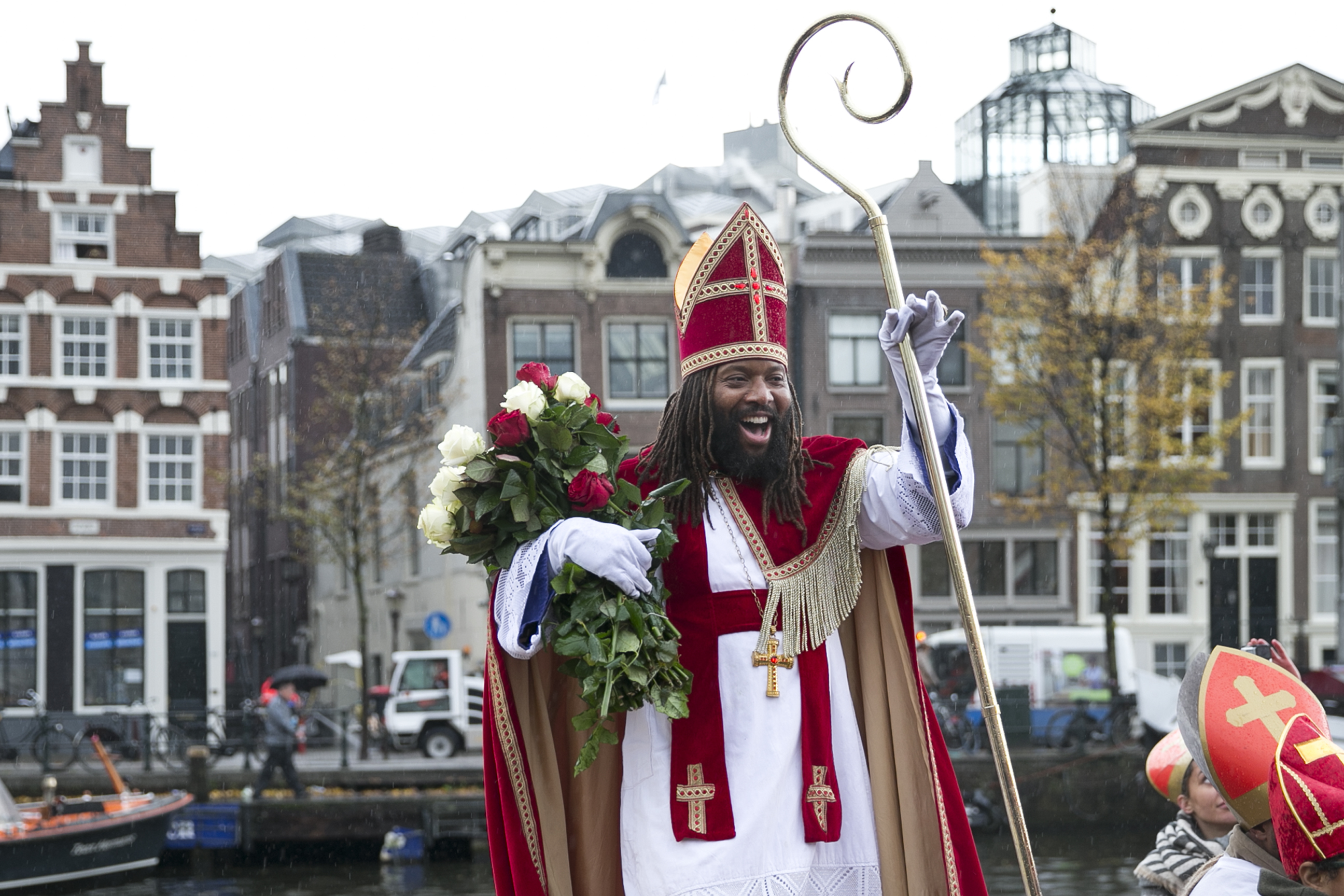 A Dutch man plays the role of Sinterklaas outdoors in Amsterdam