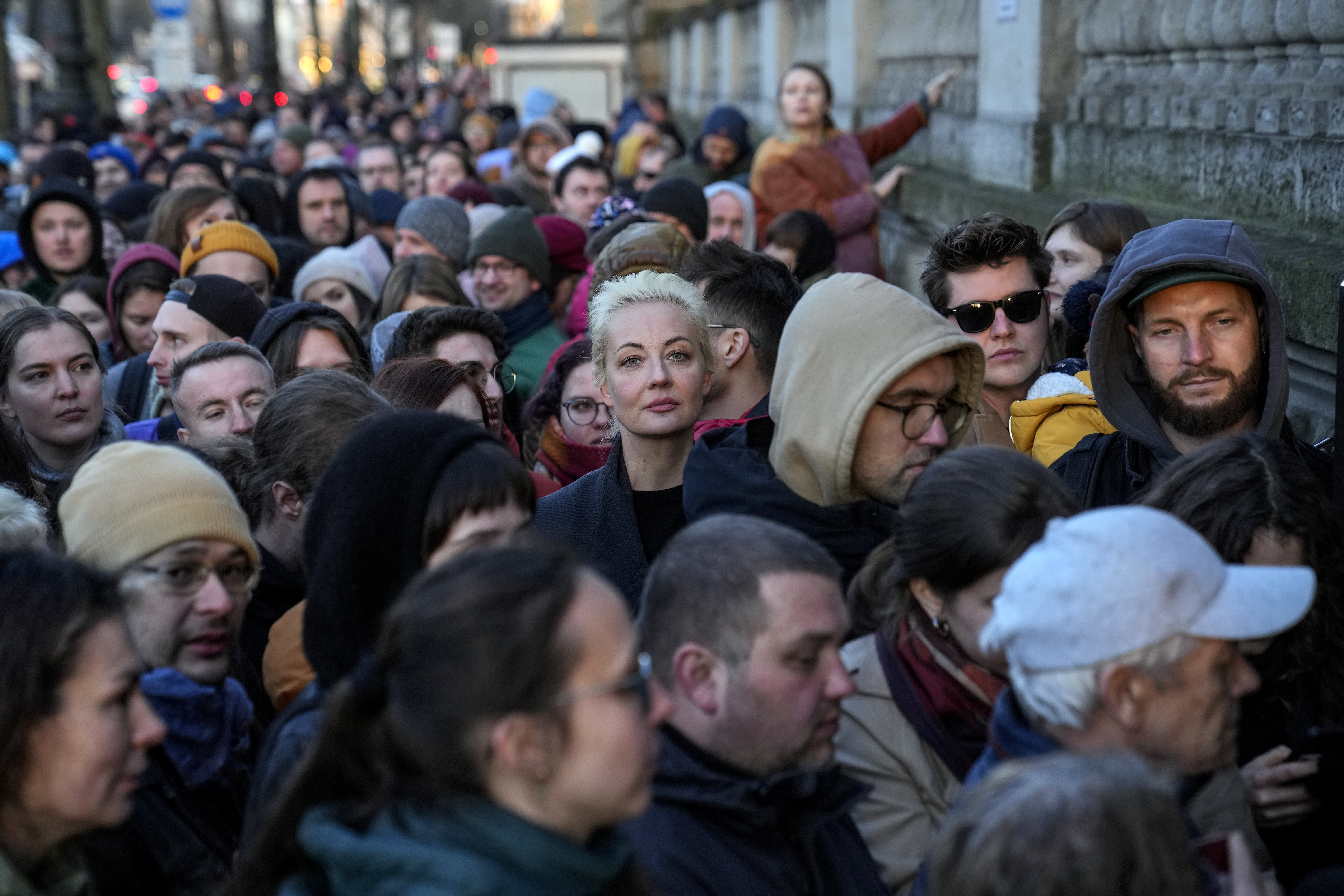 Yulia Navalnaya, center, widow of Alexey Navalny, stands in a queue with other voters at a polling station near the Russian embassy in Berlin on March 17