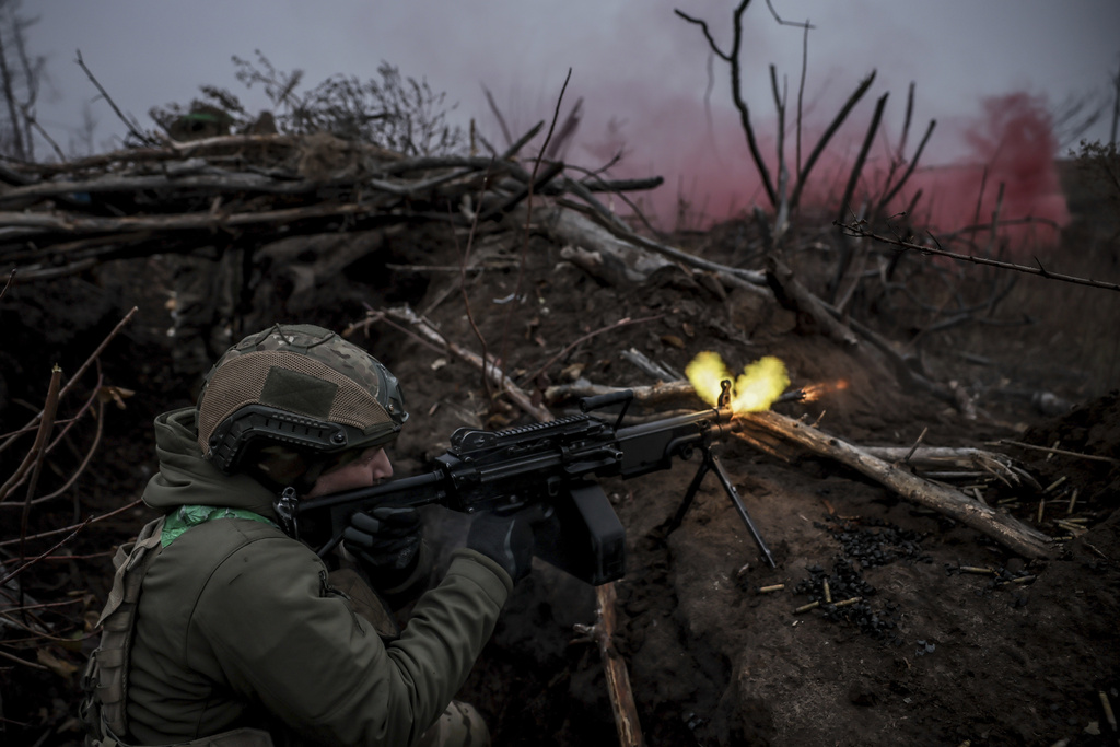 In this photo provided by Ukraine's 24th Mechanised Brigade press service, a serviceman of the 24th Mechanised Brigade improves his tactical skills at the training field in Donetsk region, Ukraine, Friday, Nov. 29, 2024. (Oleg Petrasiuk/Ukrainian 24th Mechanised Brigade via AP)