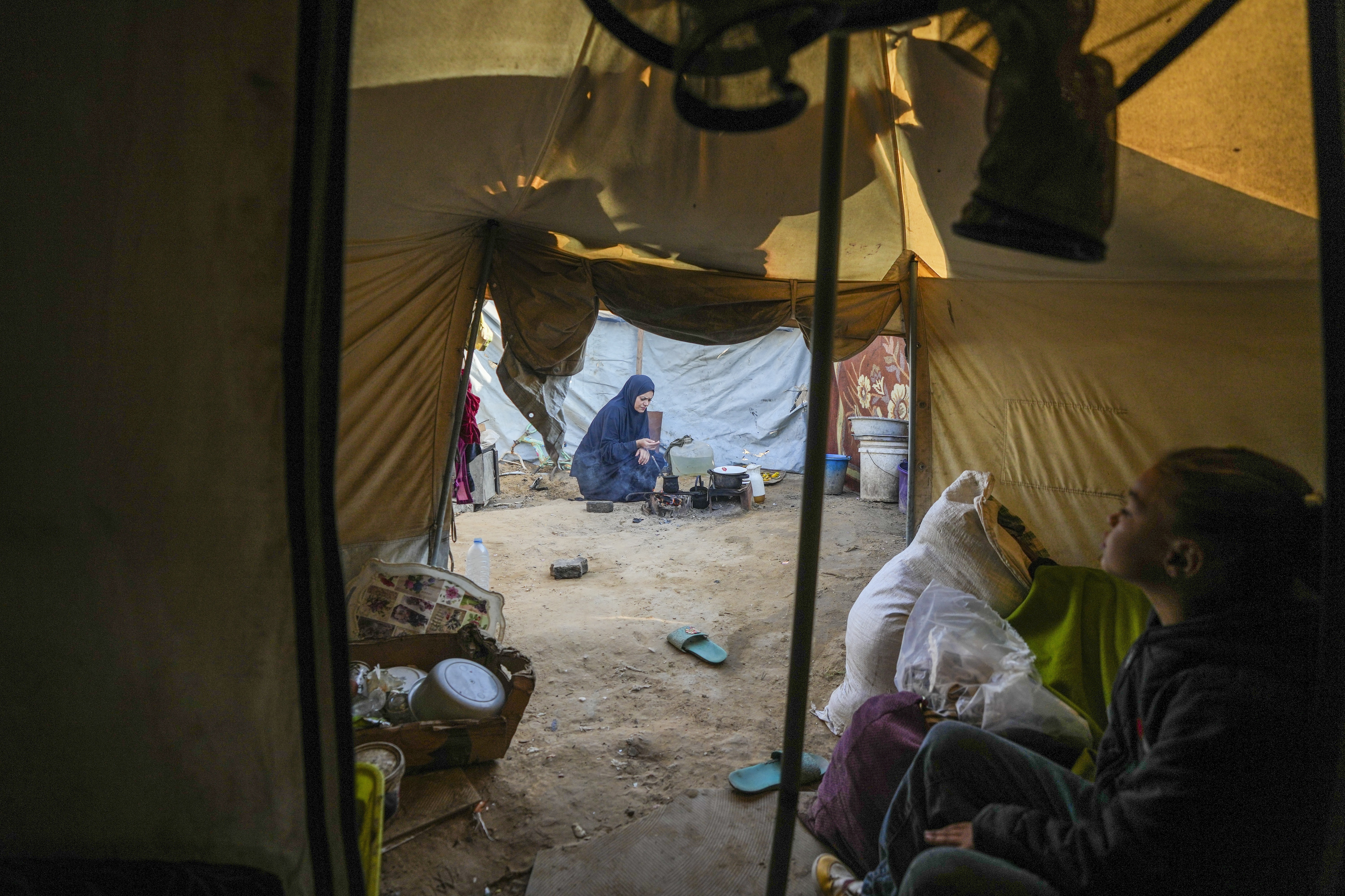 In Gaza's crowded tent camps, women wrestle with a life stripped of privacy