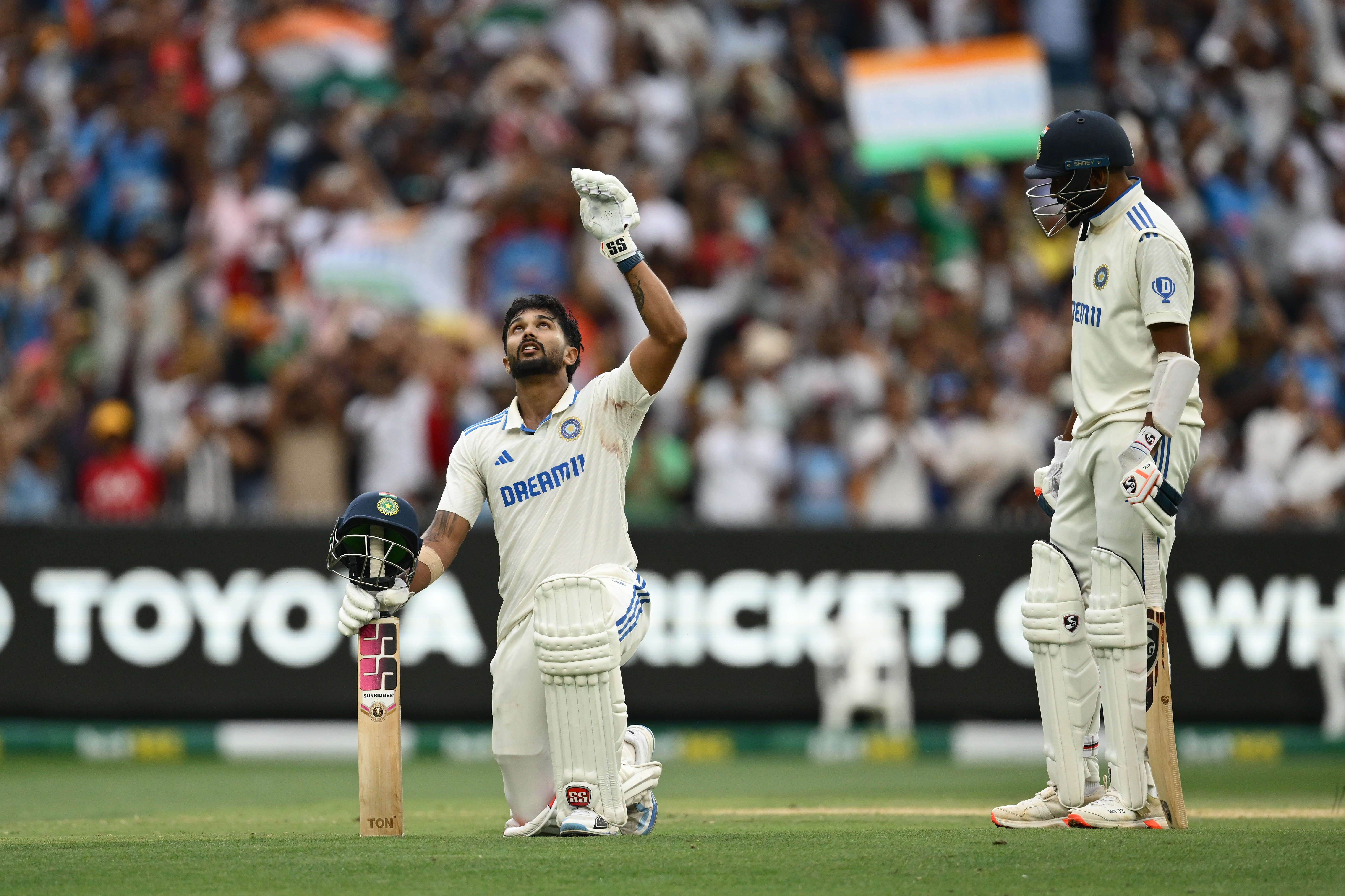 MELBOURNE, AUSTRALIA - DECEMBER 28: Nitish Kumar Reddy of India celebrates his century with Mohammed Siraj of India during day three of the Men's Fourth Test Match in the series between Australia and India at Melbourne Cricket Ground on December 28, 2024 in Melbourne, Australia. (Photo by Quinn Rooney/Getty Images)