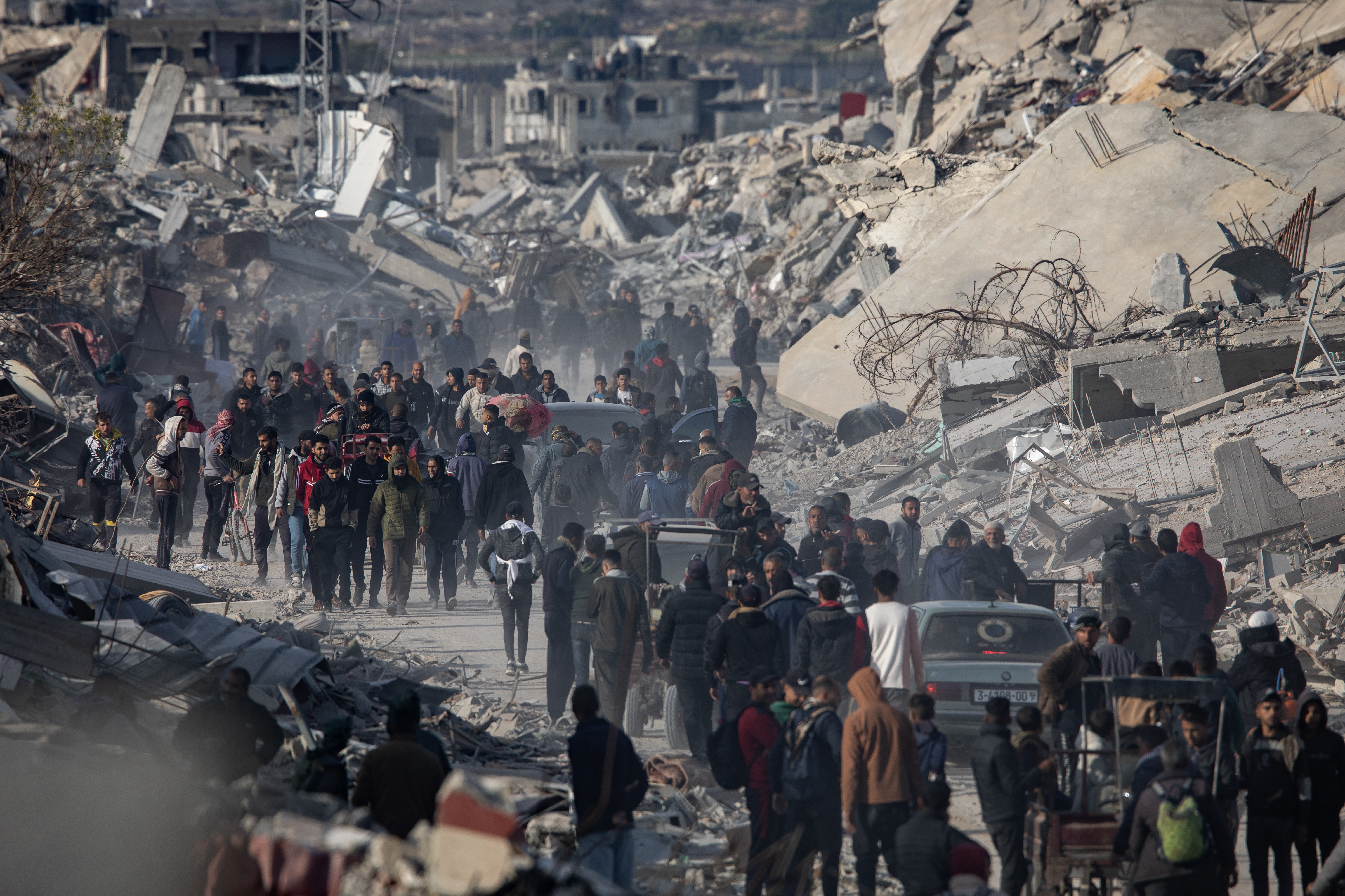 Palestinians celebrate the ceasefire announcement