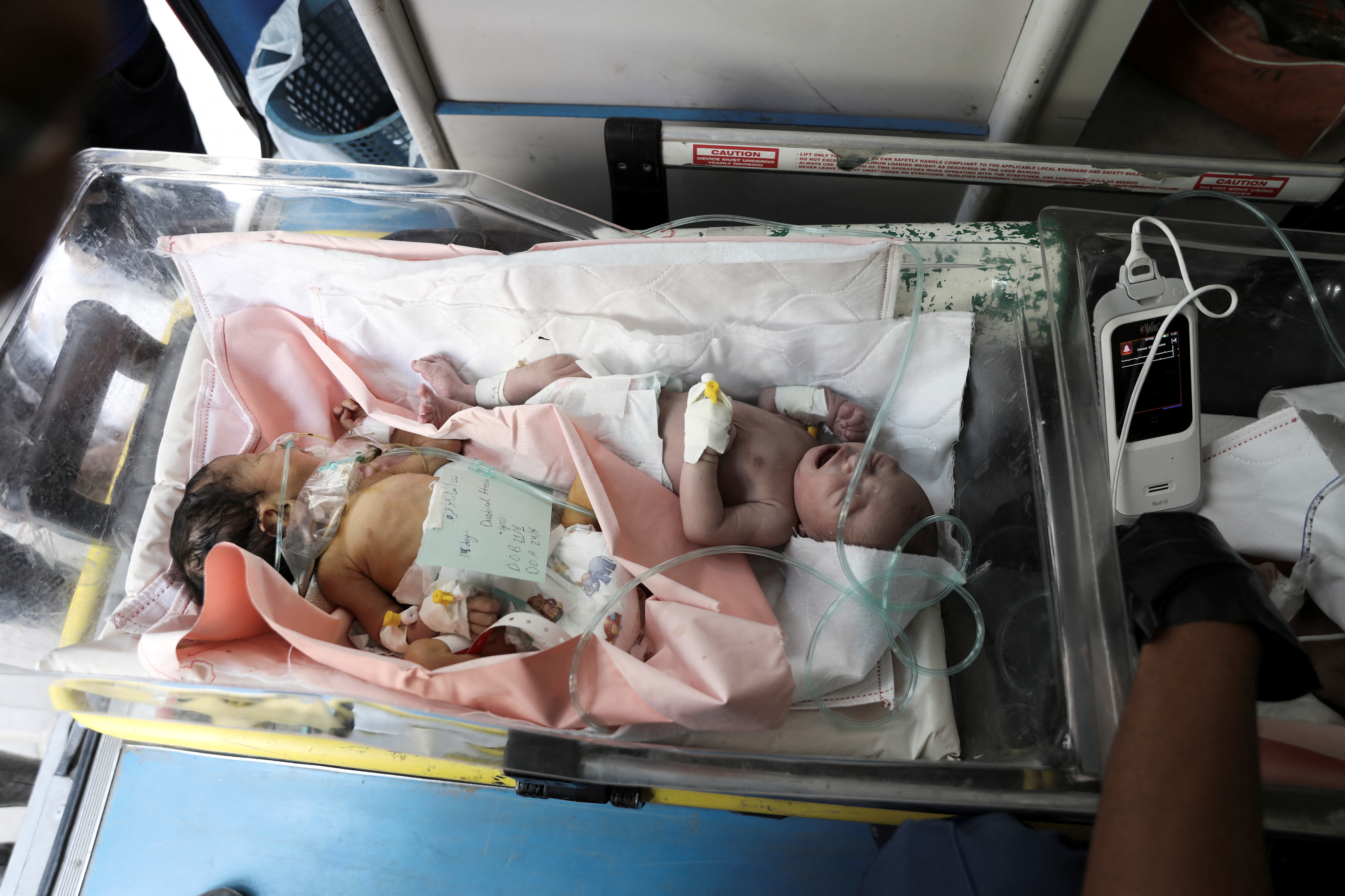 Palestinian premature babies are evacuated from Al-Aqsa Hospital to Khan Younis' Nasser hospital