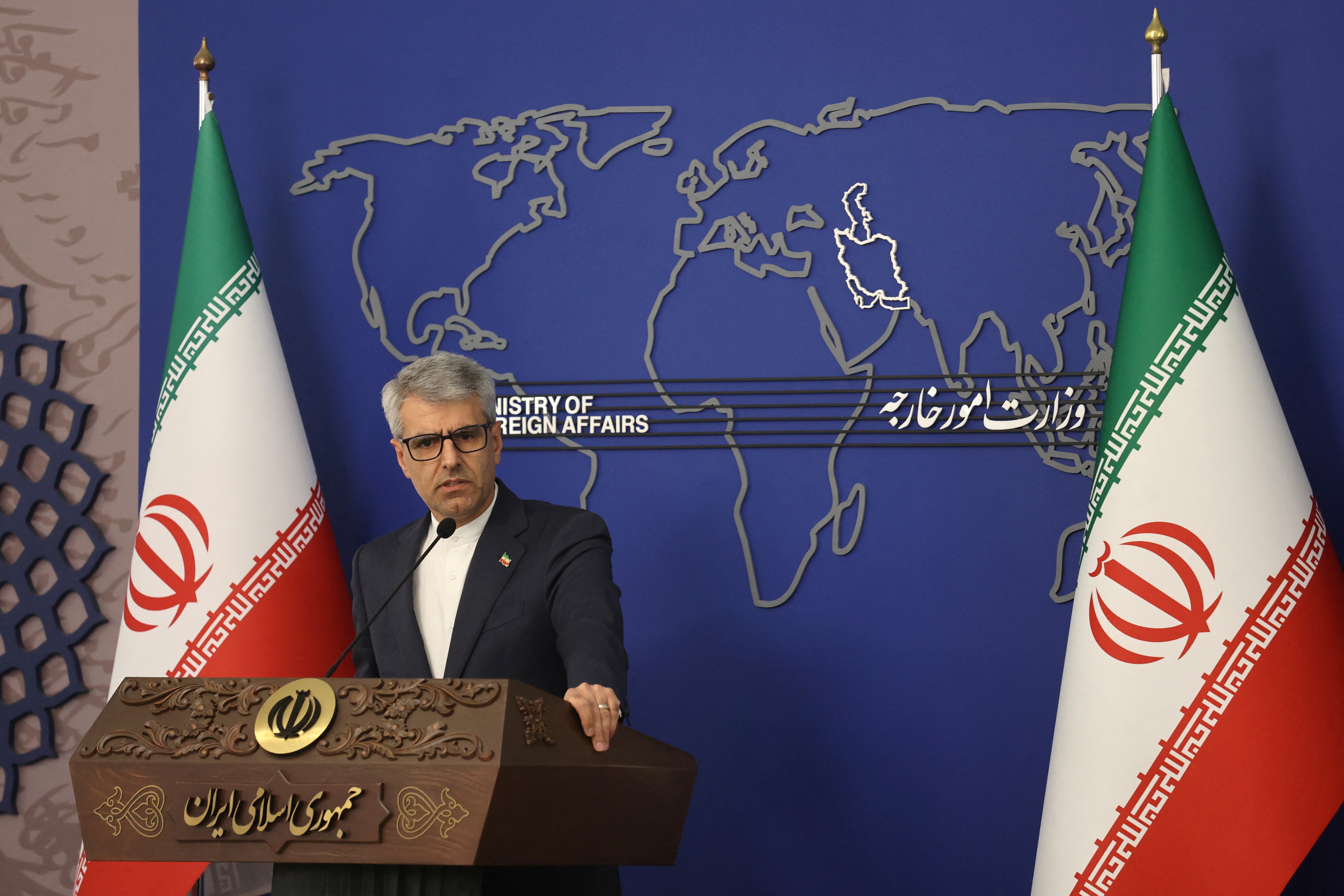 Iran's Foreign Ministry spokesman Esmail Baqaee speaks during a press conference