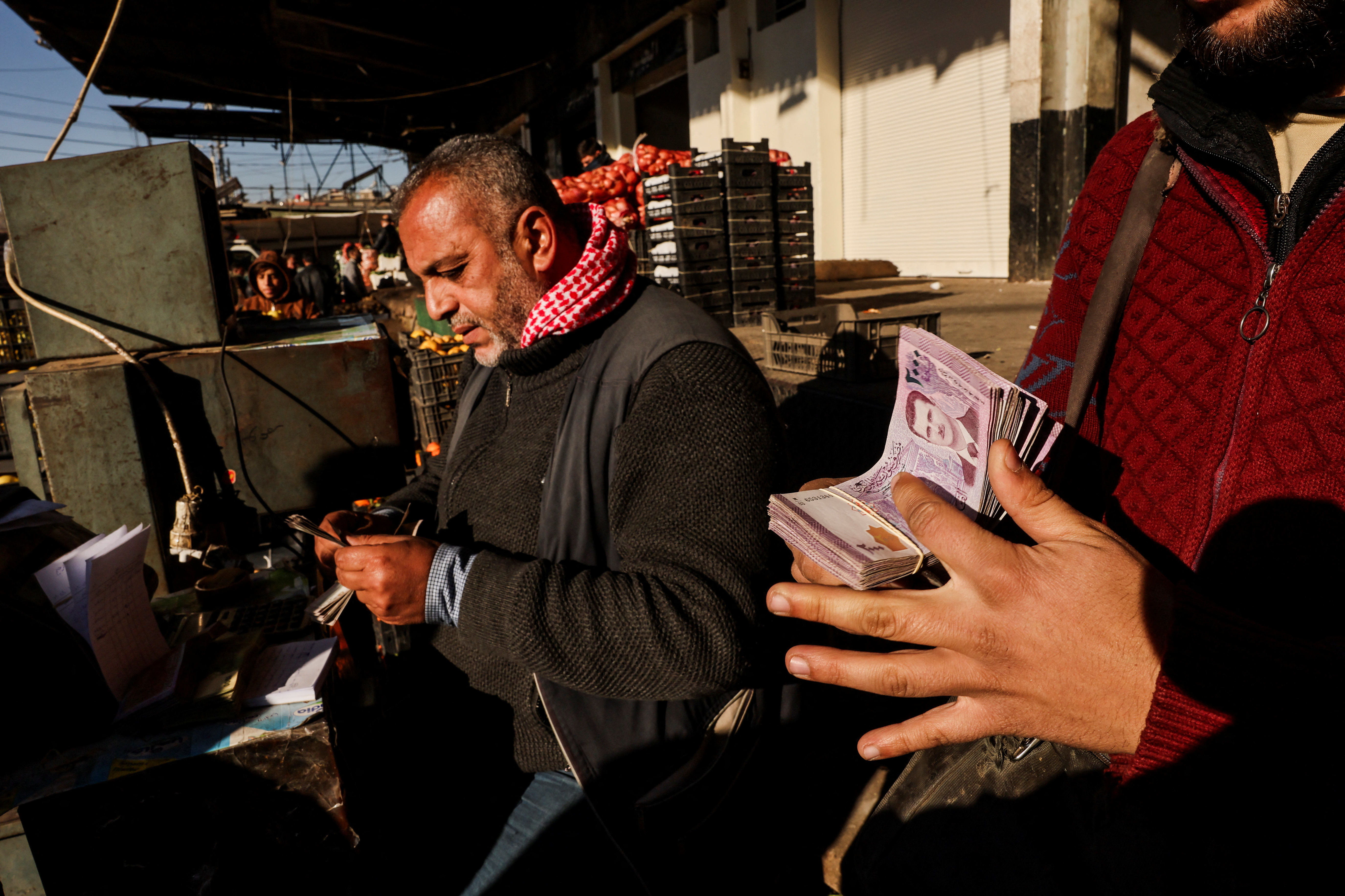 Shopkeeper counts money