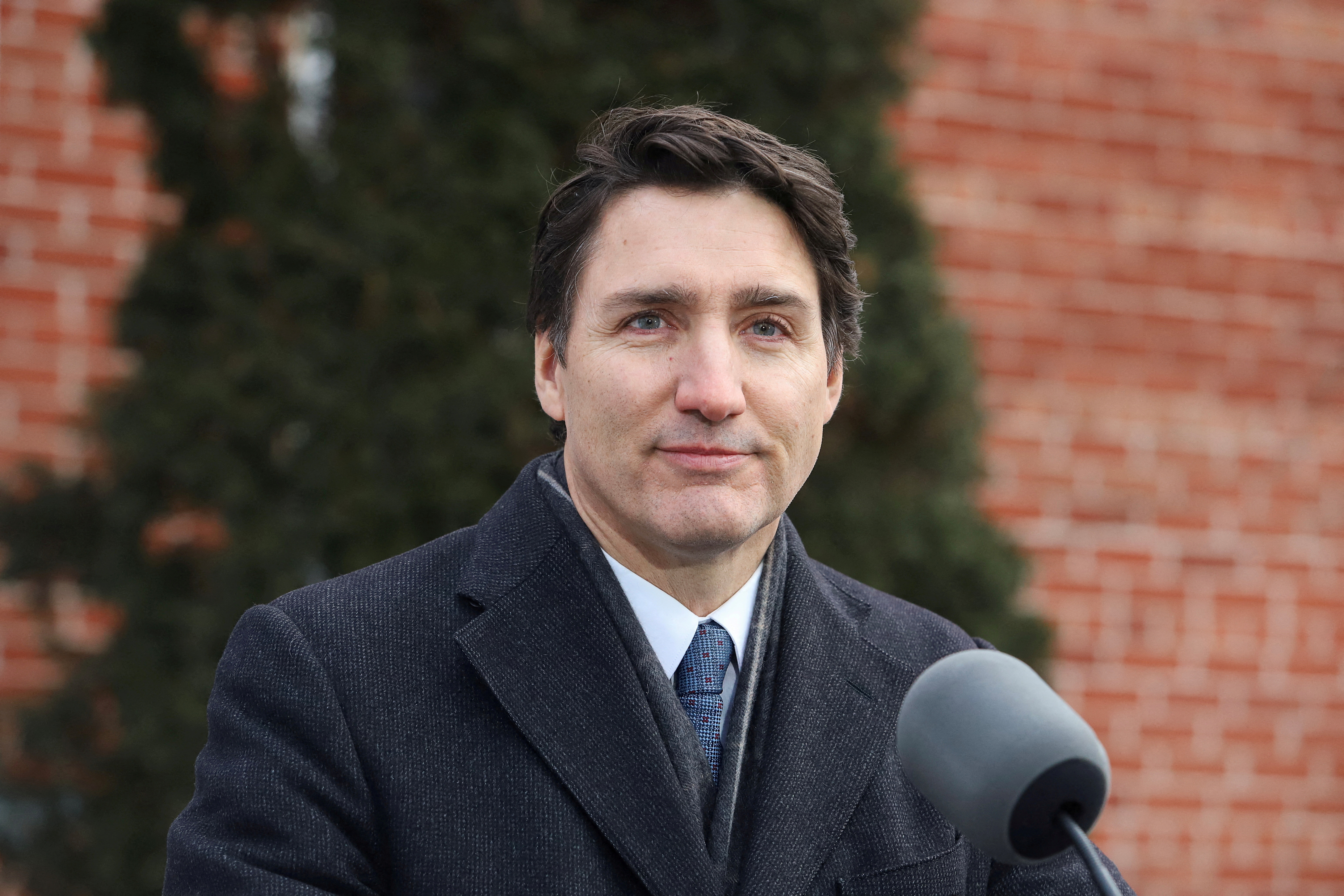 Canada's Prime Minister Justin Trudeau speaks to reporters