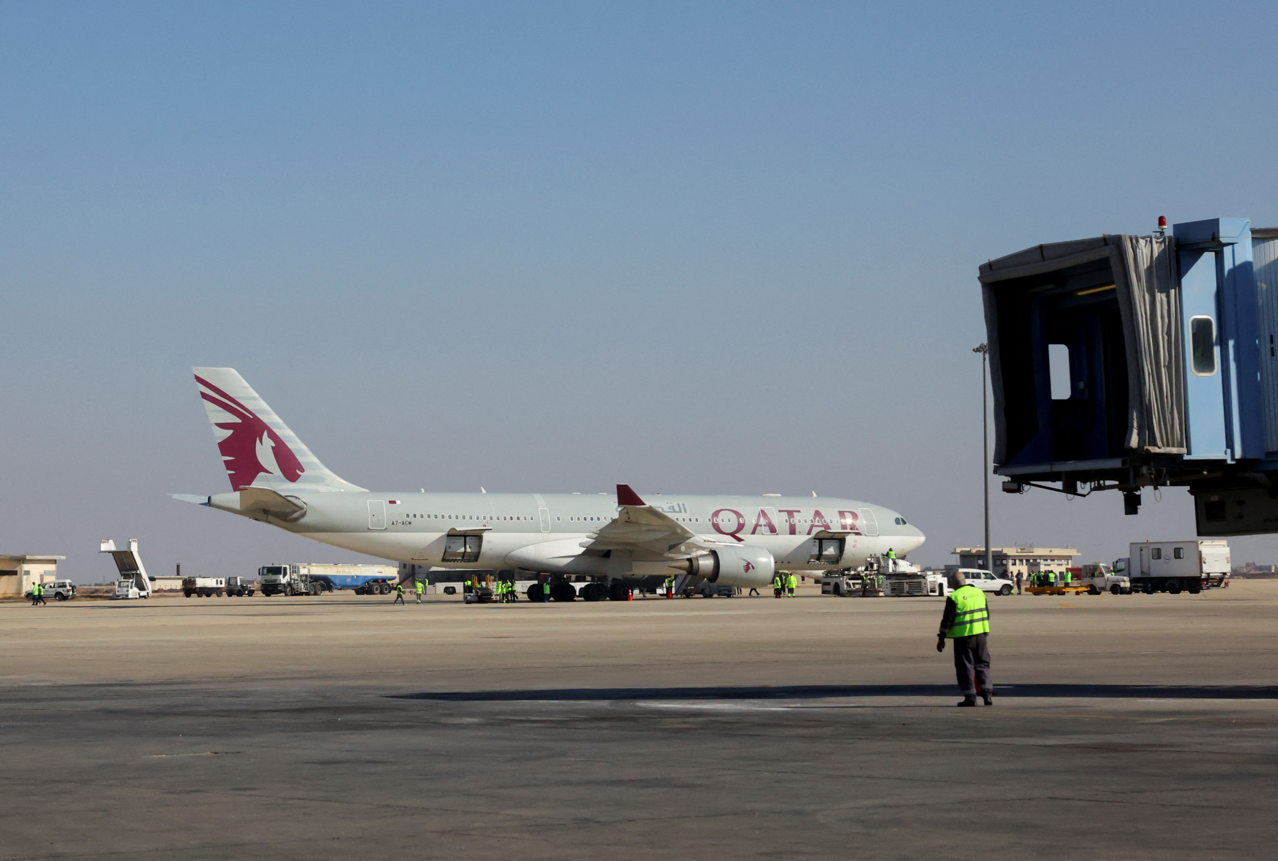 A Qatar Airways airplane lands at Damascus airport as Qatar Airways becomes the first international airline to announce the return of international flights at Damascus airport after 13 years of its suspension, in Damascus, Syria, January 7, 2025. REUTERS/Yamam Al Shaar