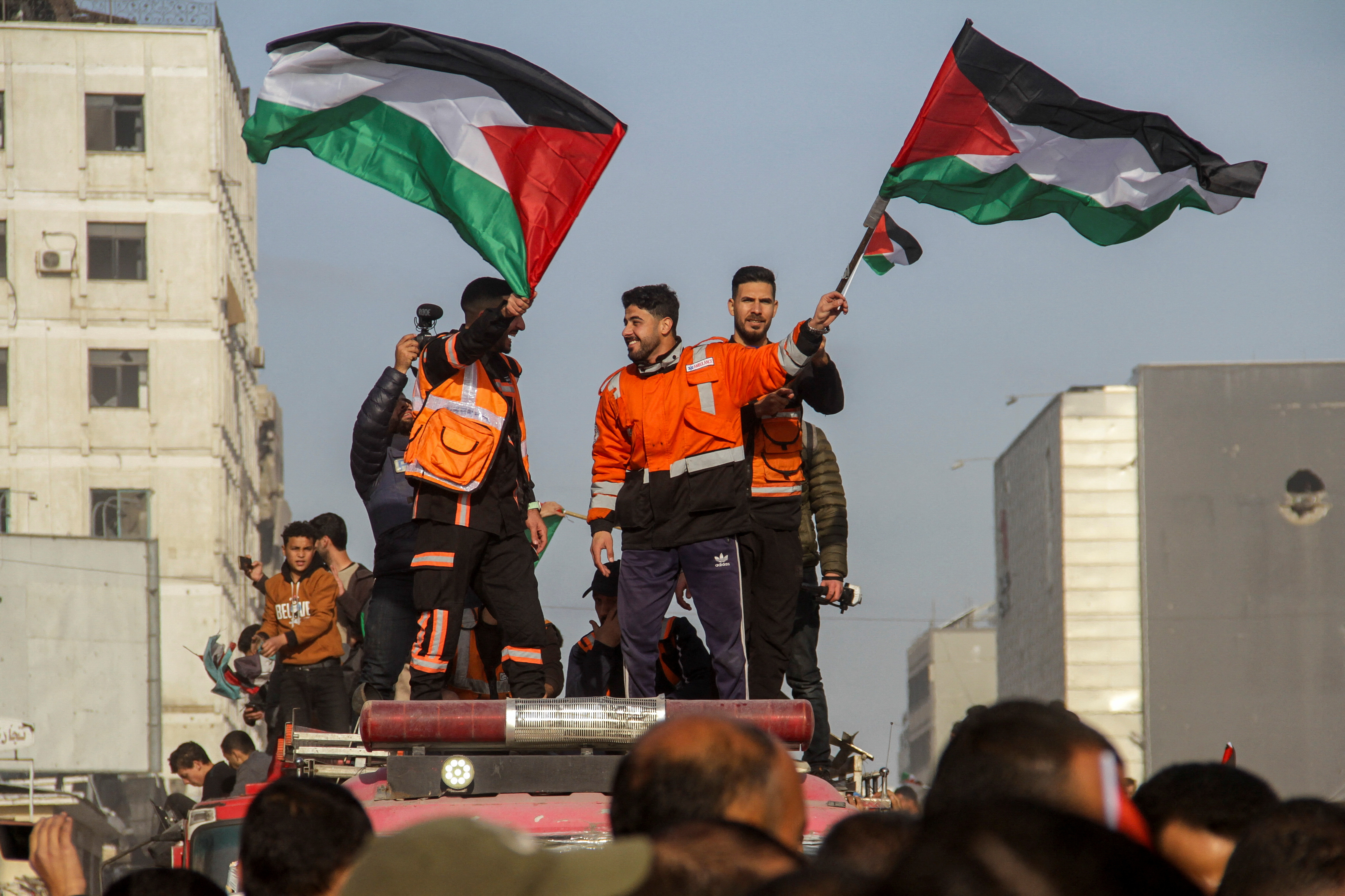 Palestinians celebrate the ceasefire announcement