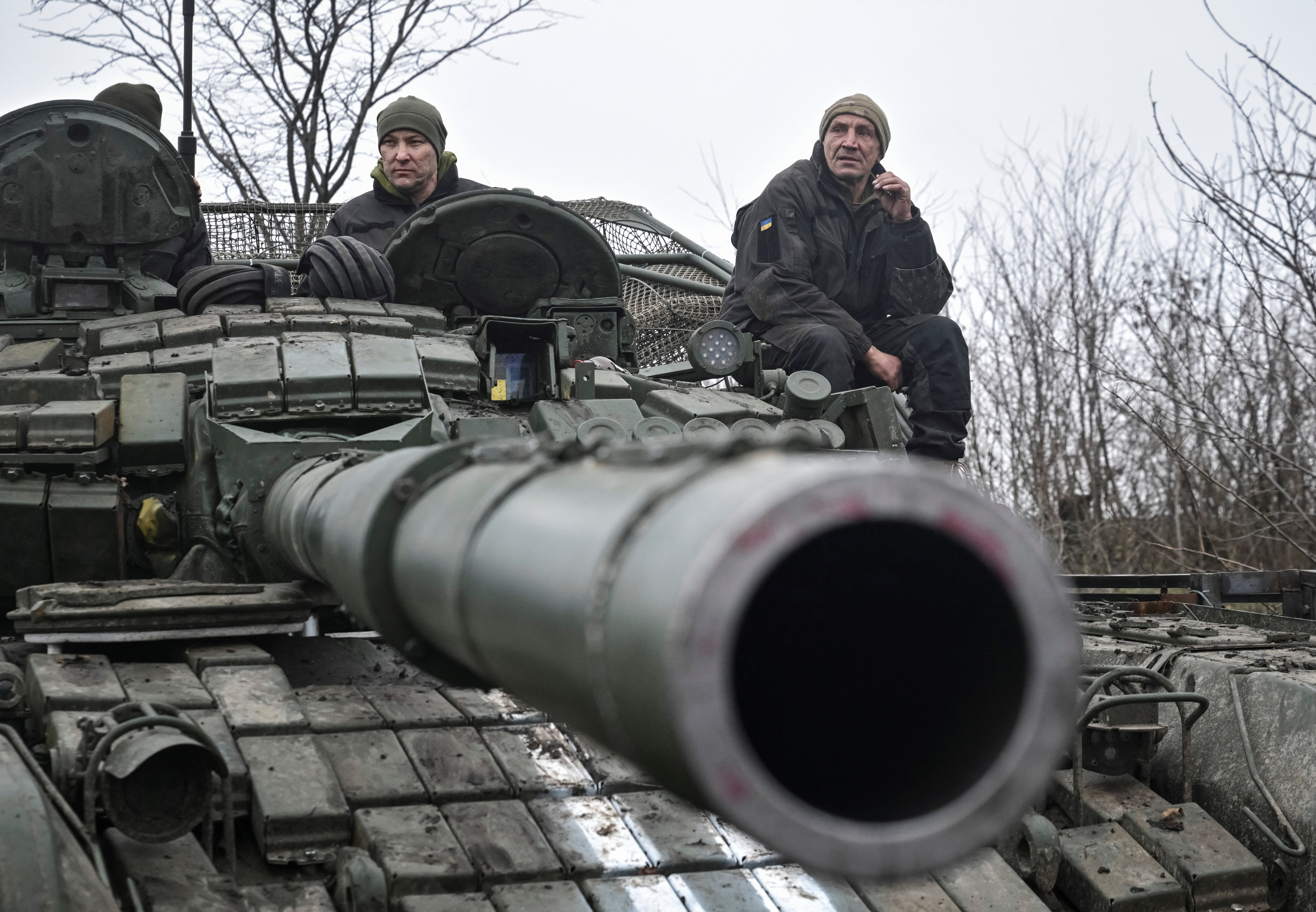 Ukrainian servicemen atop a tank attend a training in Zaporizhia region