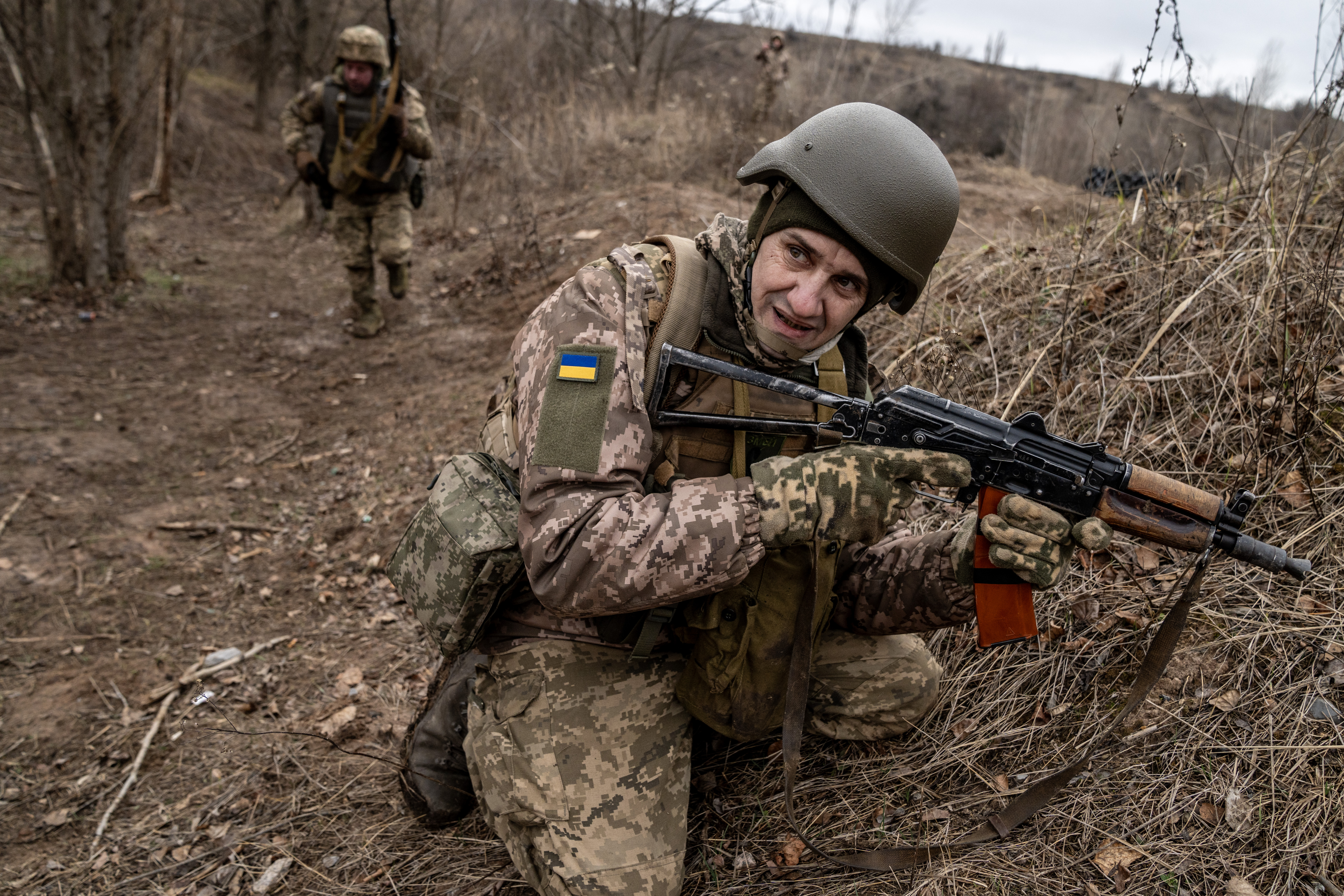 Ukrainian soldiers being trained for tactical infantry operations in rural area